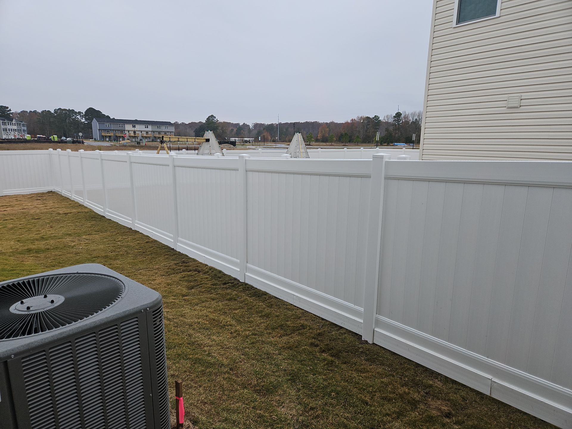 A Perfect Fence for a Brand-New Home by Tidewater Fence