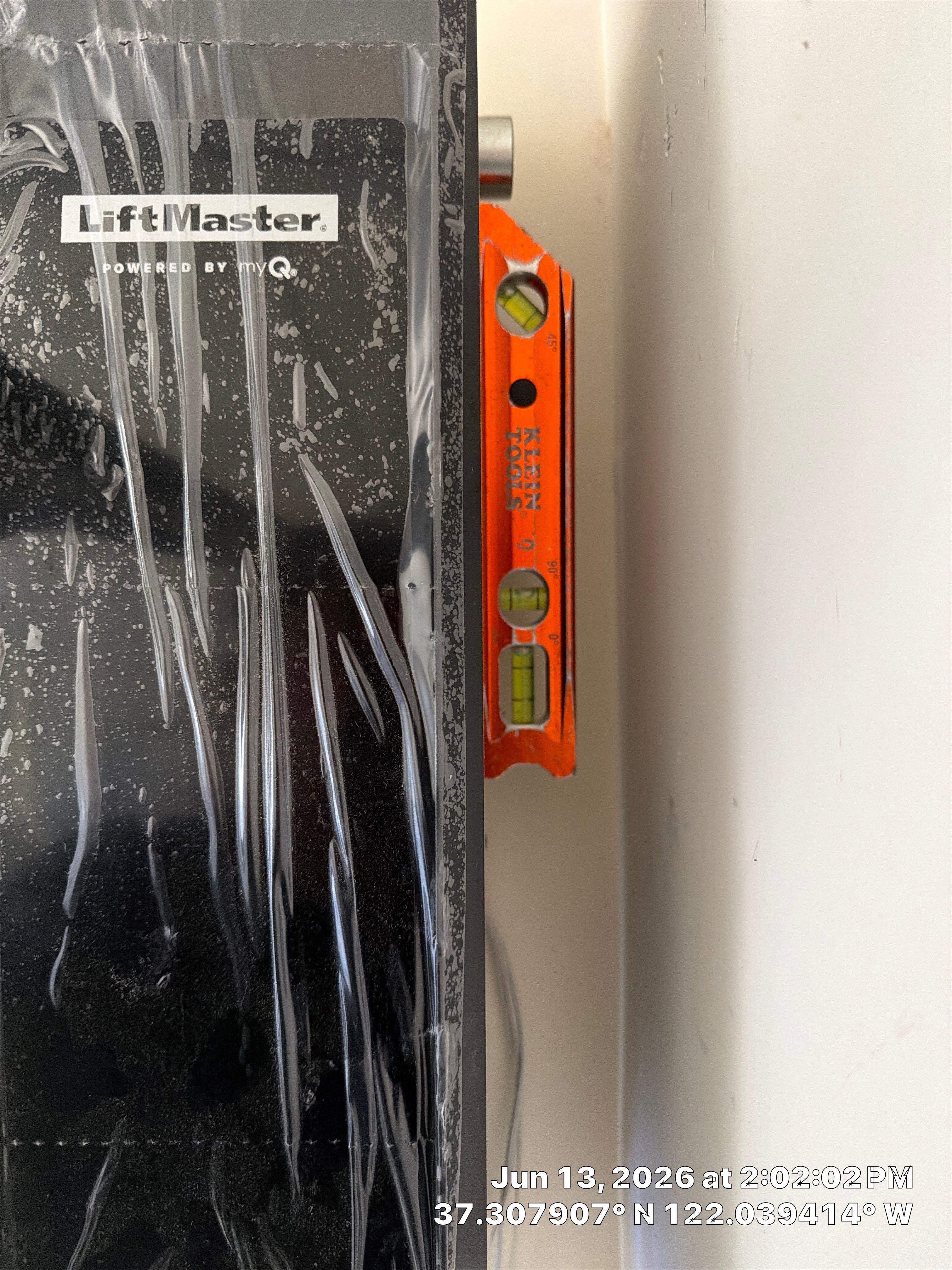 Modern Black Garage Door Installation With Vertical Windows In Cupertino by Valiant Garage Door