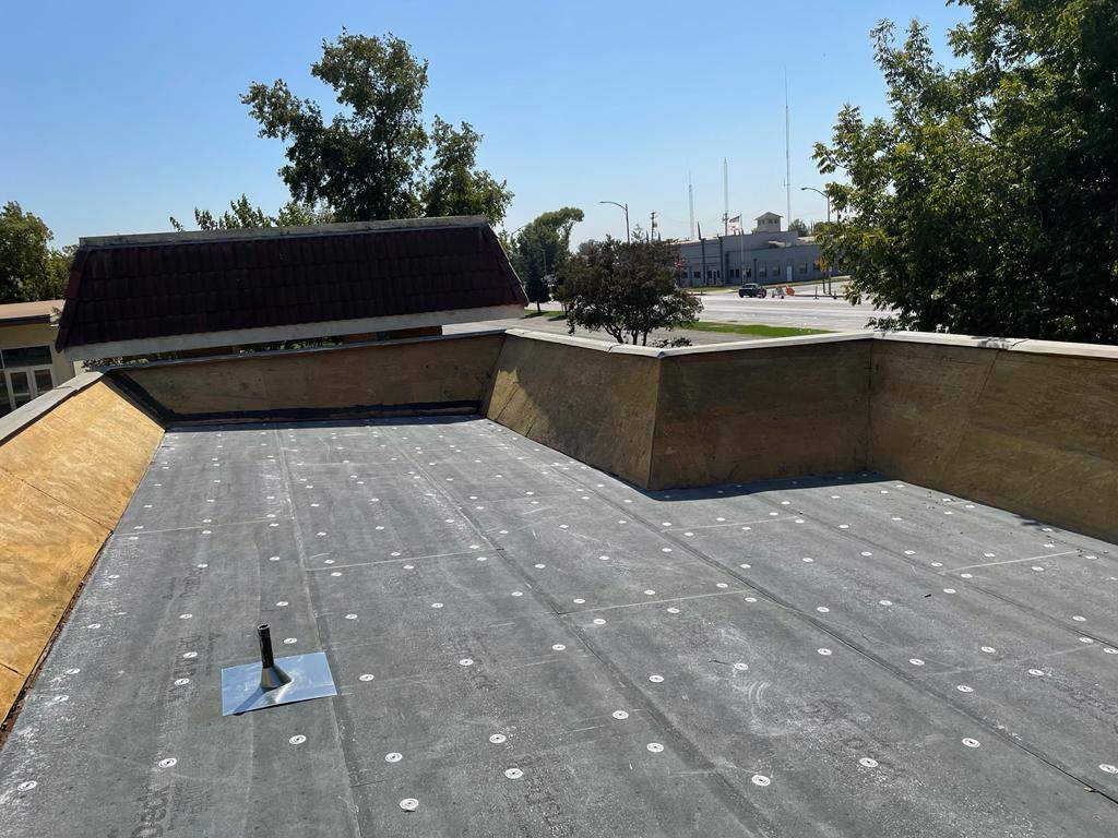 Commercial Roofing Installation using General Coatings acrylic coatings and spray foam by Straight Edge Roofing Inc
