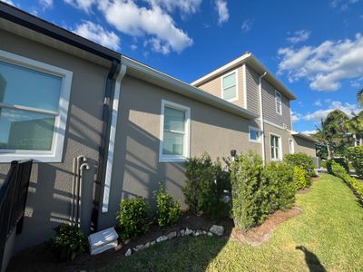 Bronze Downspouts & 7-Inch K-style Seamless Gutter Installation in Fort Myers FL