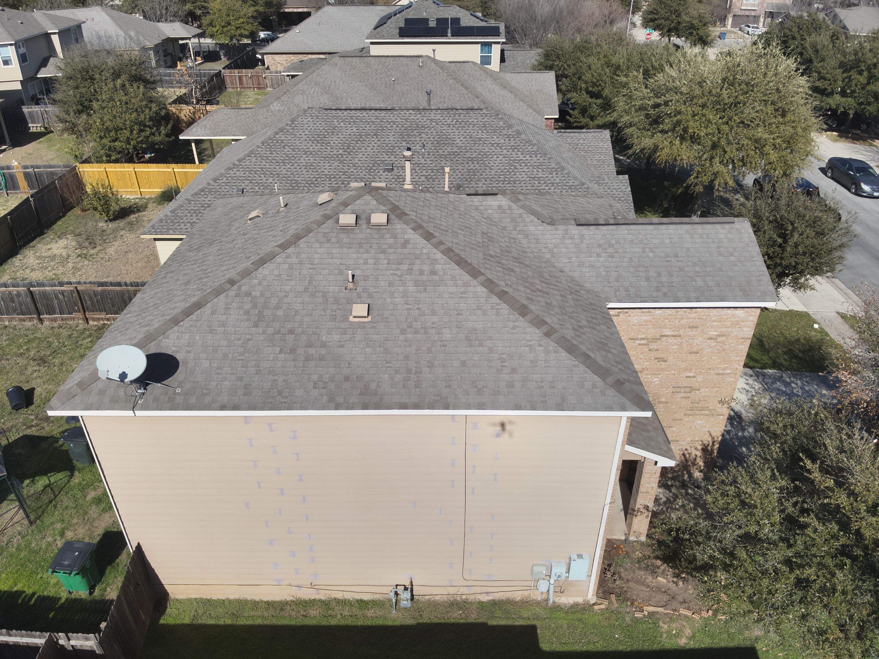 Residential Roof Replacement using Owens Corning - Duration - Driftwood by Action Exteriors Austin