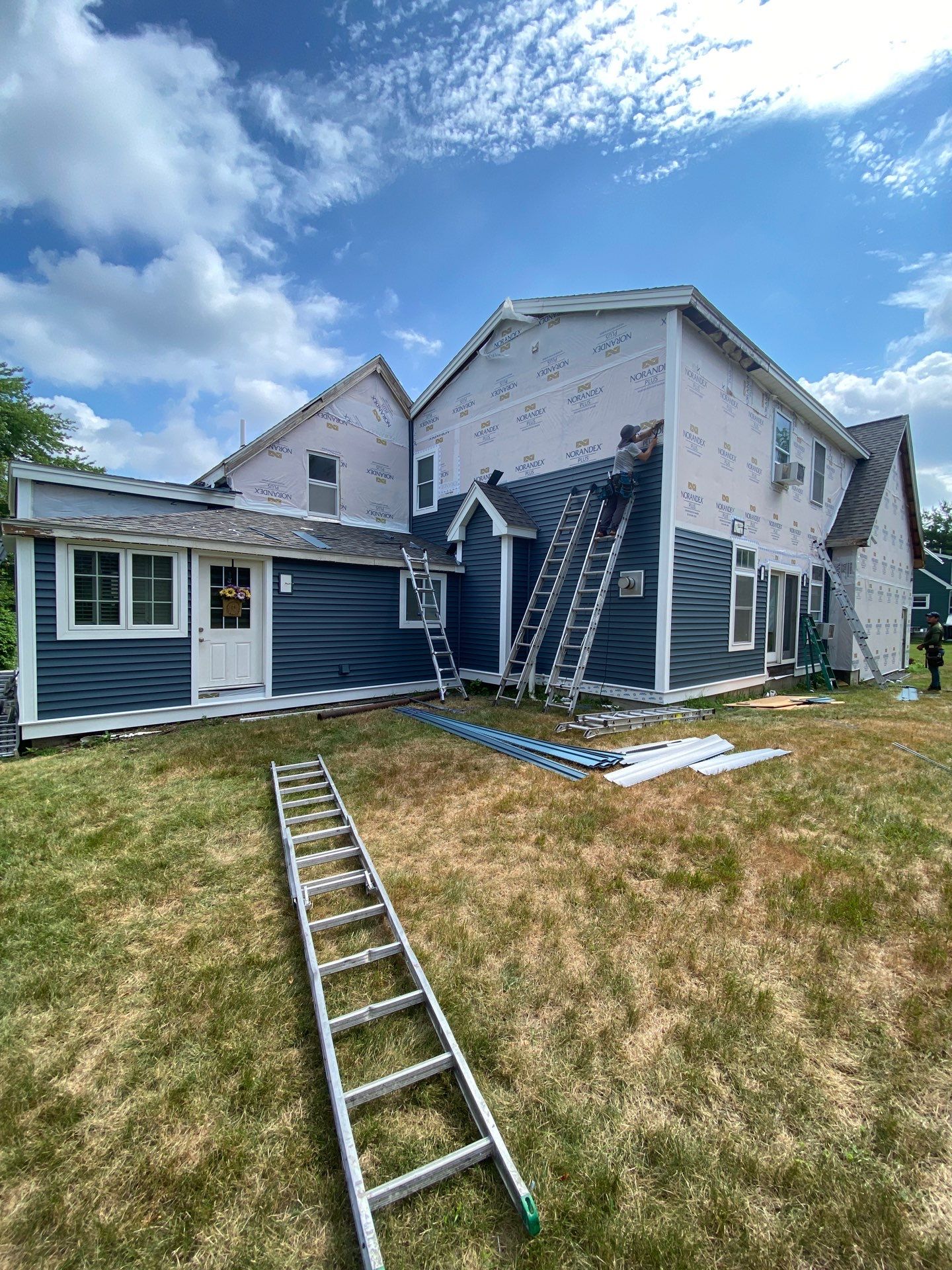 Premium Mixed-Material Siding Installation in North Billerica, MA by Mighty Dog Roofing of Greater Middlesex County