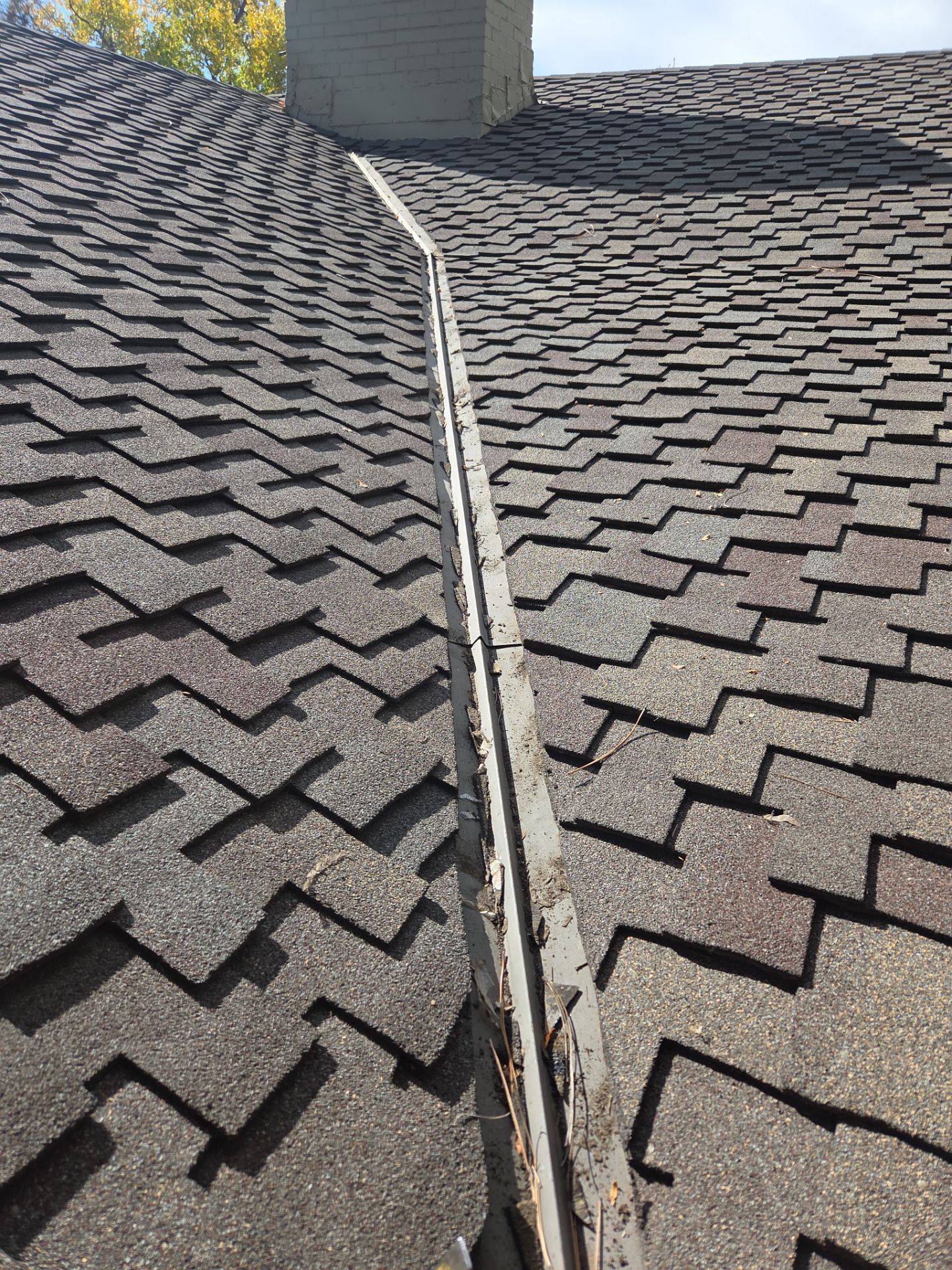 Valley leak repair by RTP Roofing Company