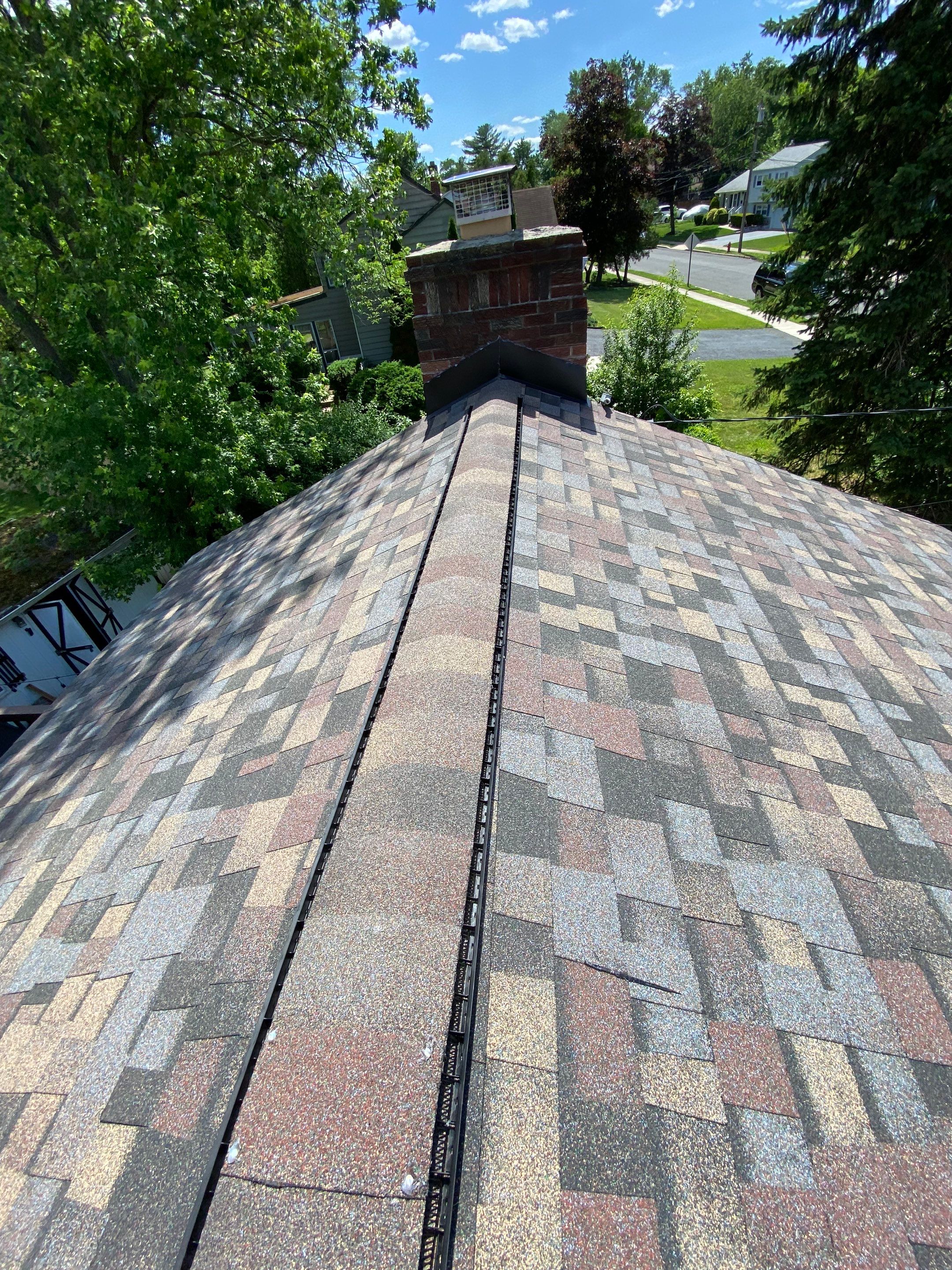 Harvest Blend Shingles by Reimagine Roofing