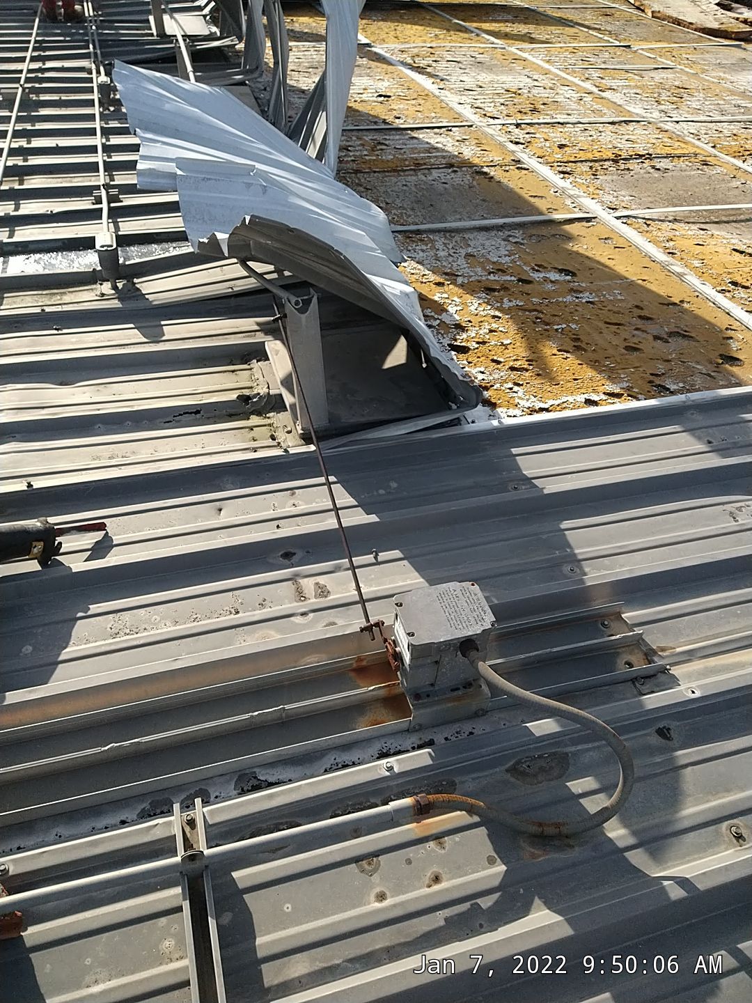 Commercial Roofing Installation using Aluminum Roofing panels by Hostetler Roofing