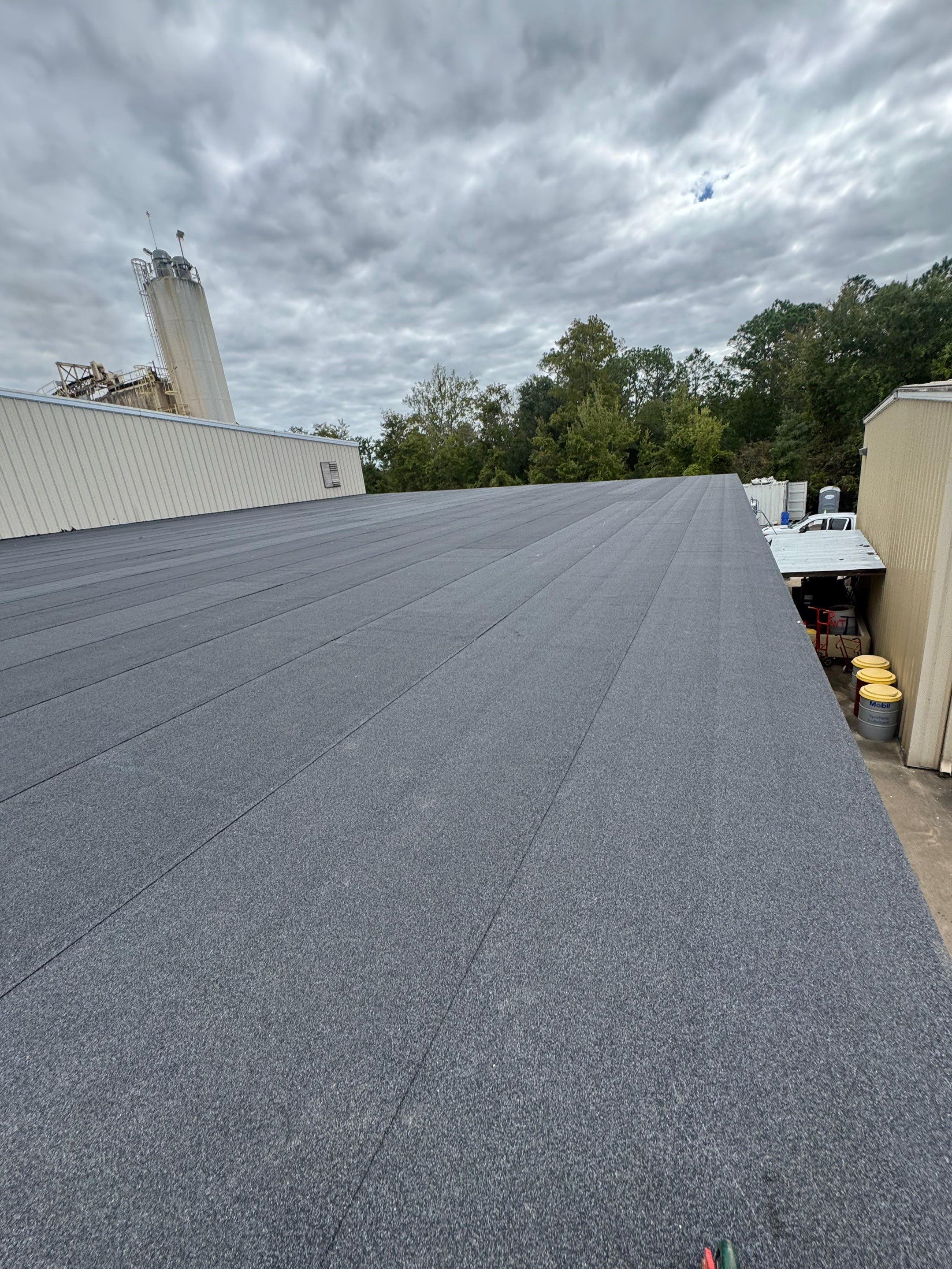 Flat Reroof Replacement Bunnell FL by Pinnacle Roofing Group