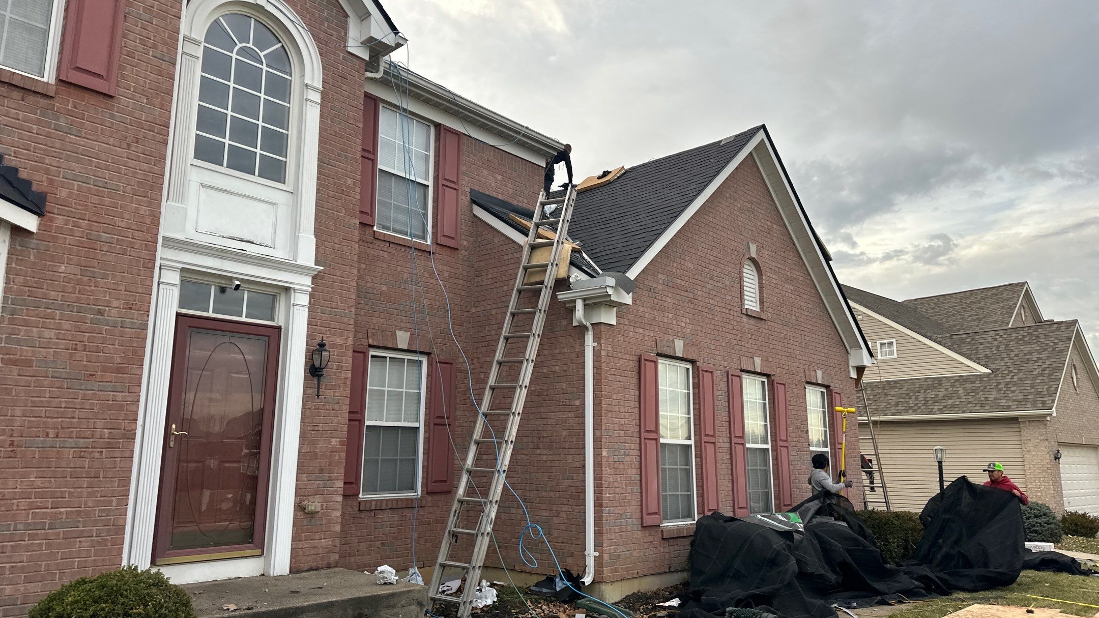 Walden Ponds - Pristine Black and Hydro Flo Gutter Guards by Tamlin Roofing