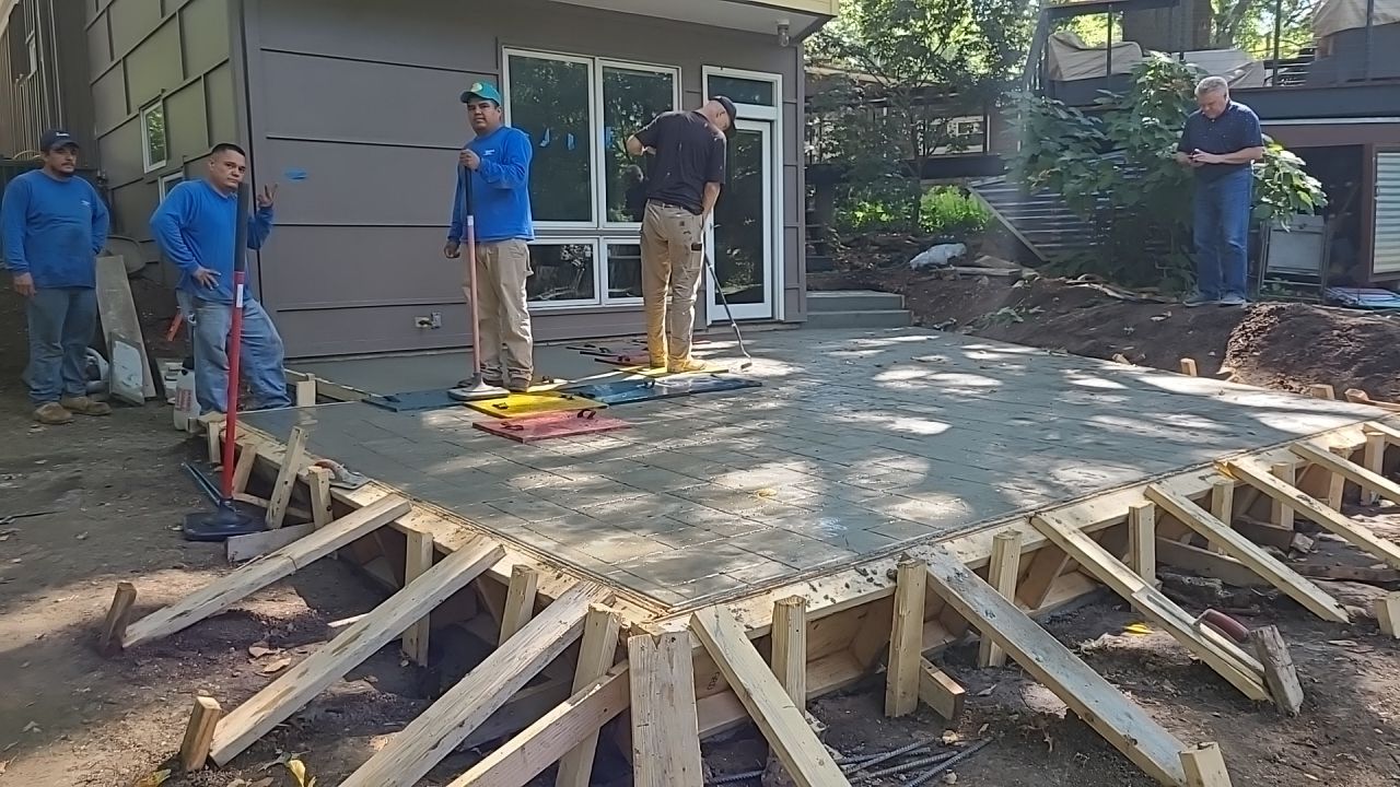 Back Yard Cantilivered Patio by LAND ESCAPES LLC