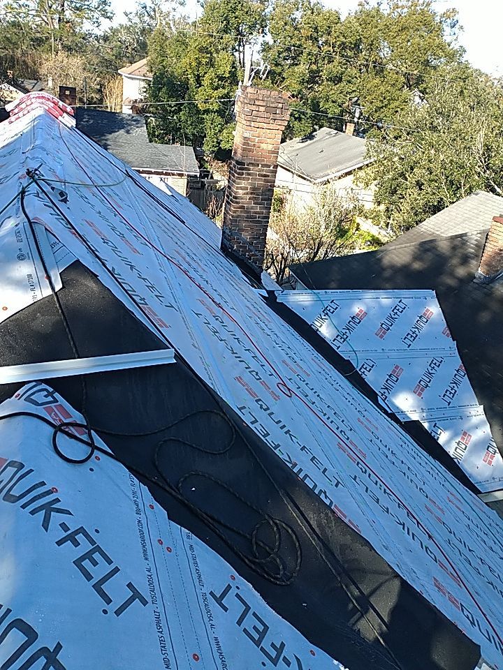 Residential Roofing Installation using Roof Replacement by American Roofing & Construction LLC