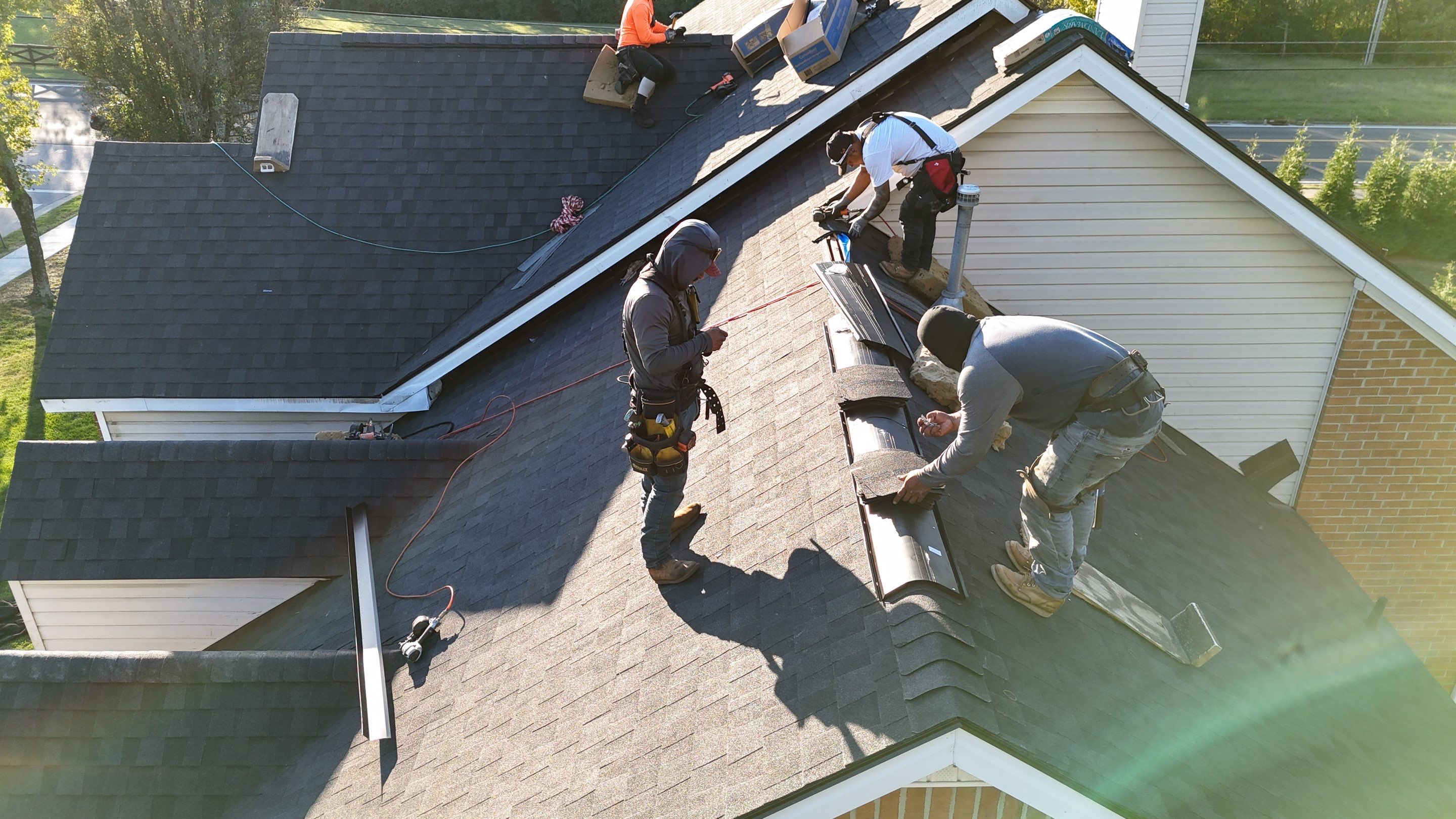 Charcoal Black Re-Roof & Gutters by Royal House LLC