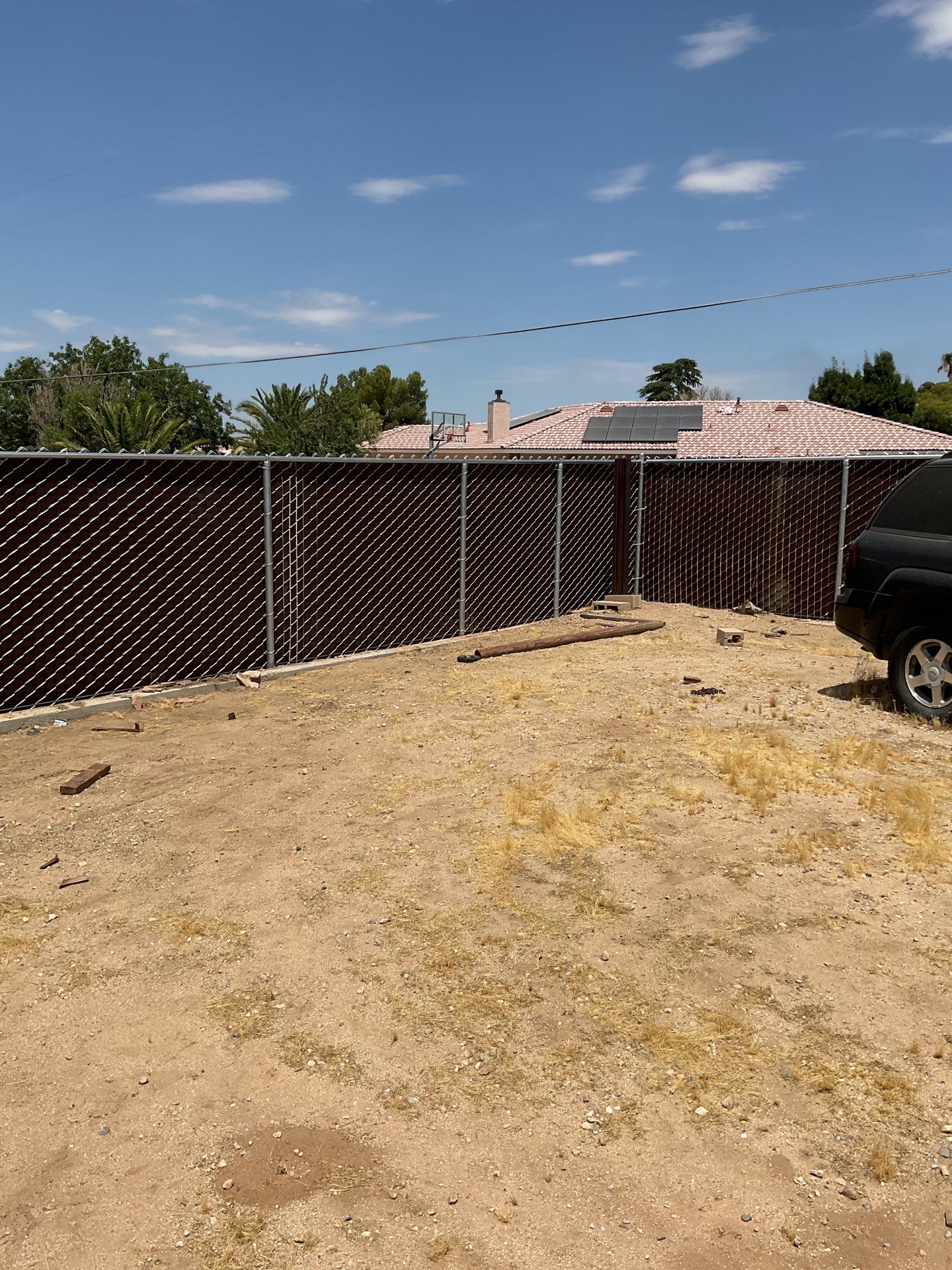 Dark Brown Privacy Chain Link Fence by Fence Guys Inc.