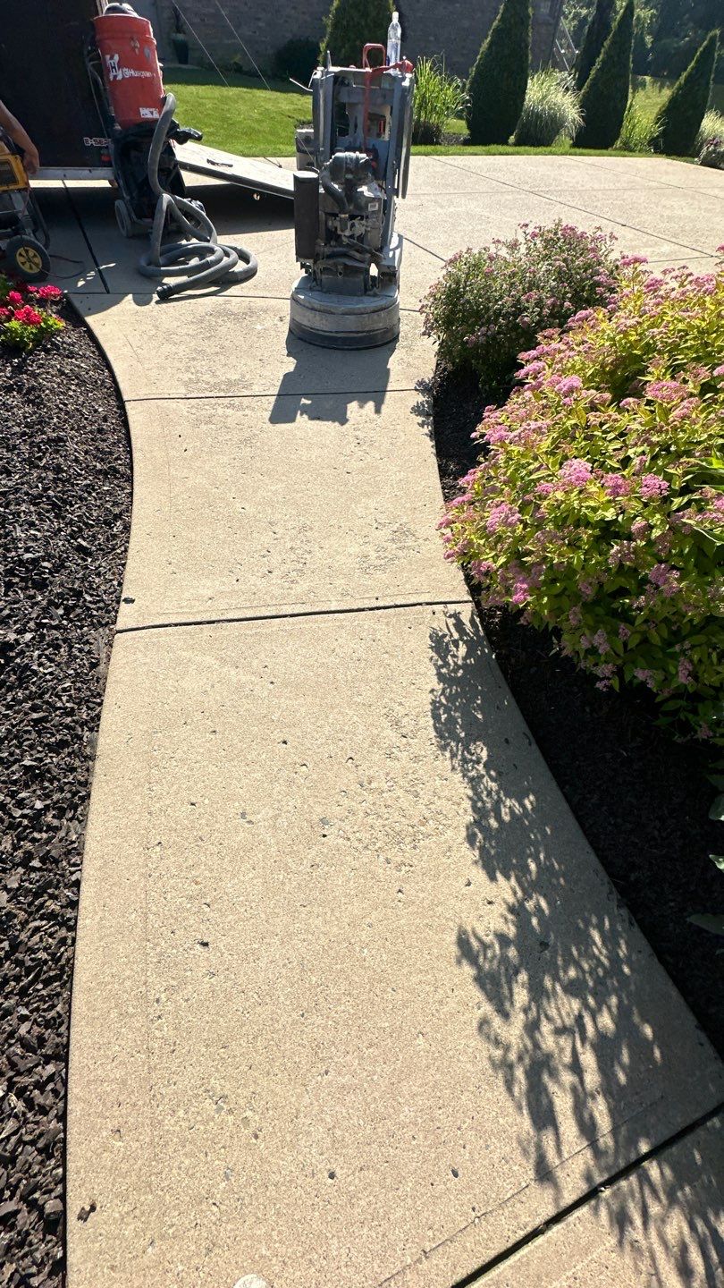 Driveway + Garage + Walkway Project in Meridian by Floors in a Day, Inc