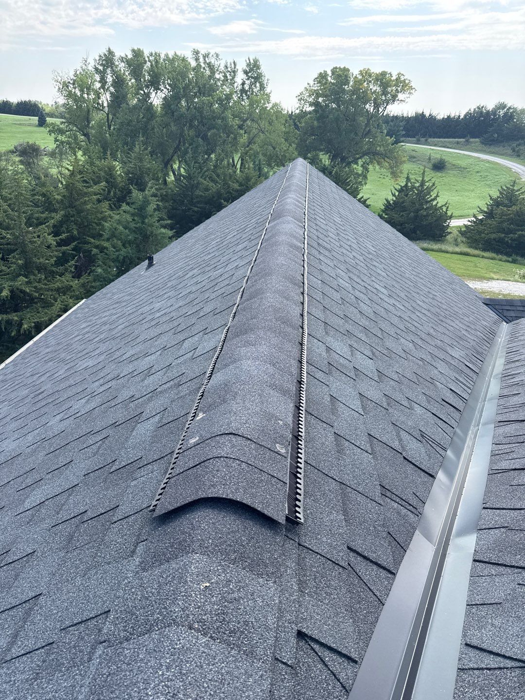 Roof Replacement with Ridge Vent and New Soffit in West Point, NE by Crows Roofing LLC