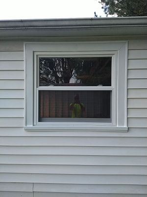 Siding Installation using Norandex woodsman dl-5 white woodgrain vinyl