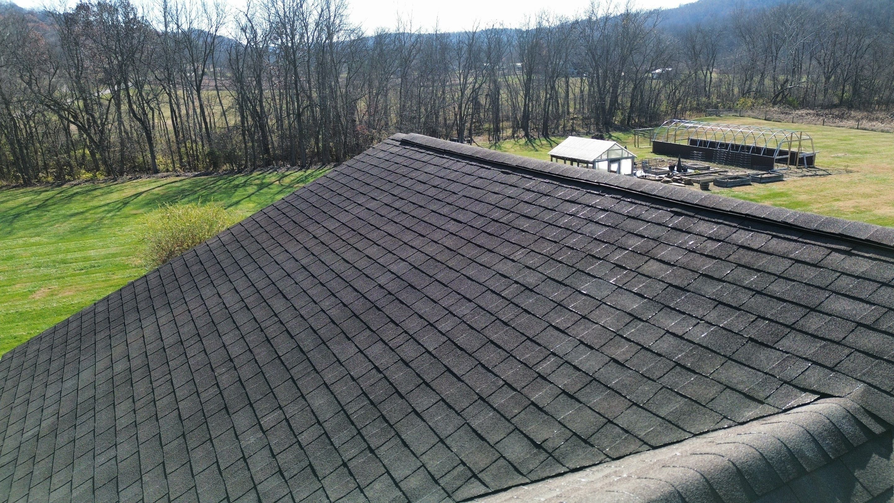 Residential Roofing Installation using Performance Panel Metal - Frost Black by RoofX 