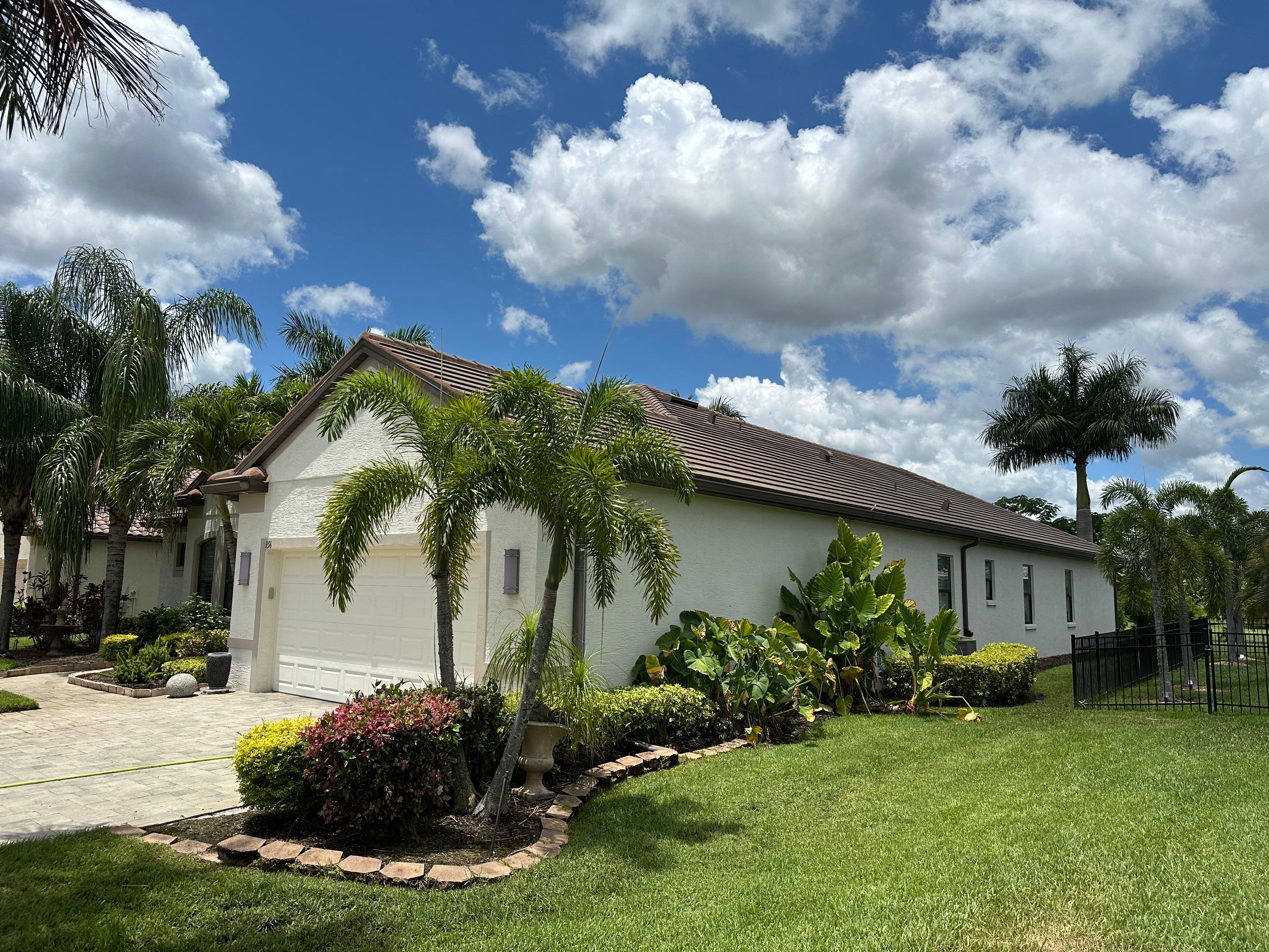 Flat Tile Roof Cleaning, House Wash & Sidewalk Cleaning in Enclave at Country Meadows, Bradenton, FL | Sunshine AquaWash by Sunshine AquaWash