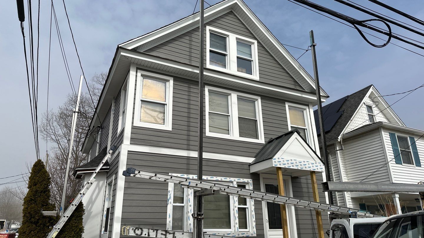 Siding Installation using Hardie Plank Aged Pewter by A Plus Exterior