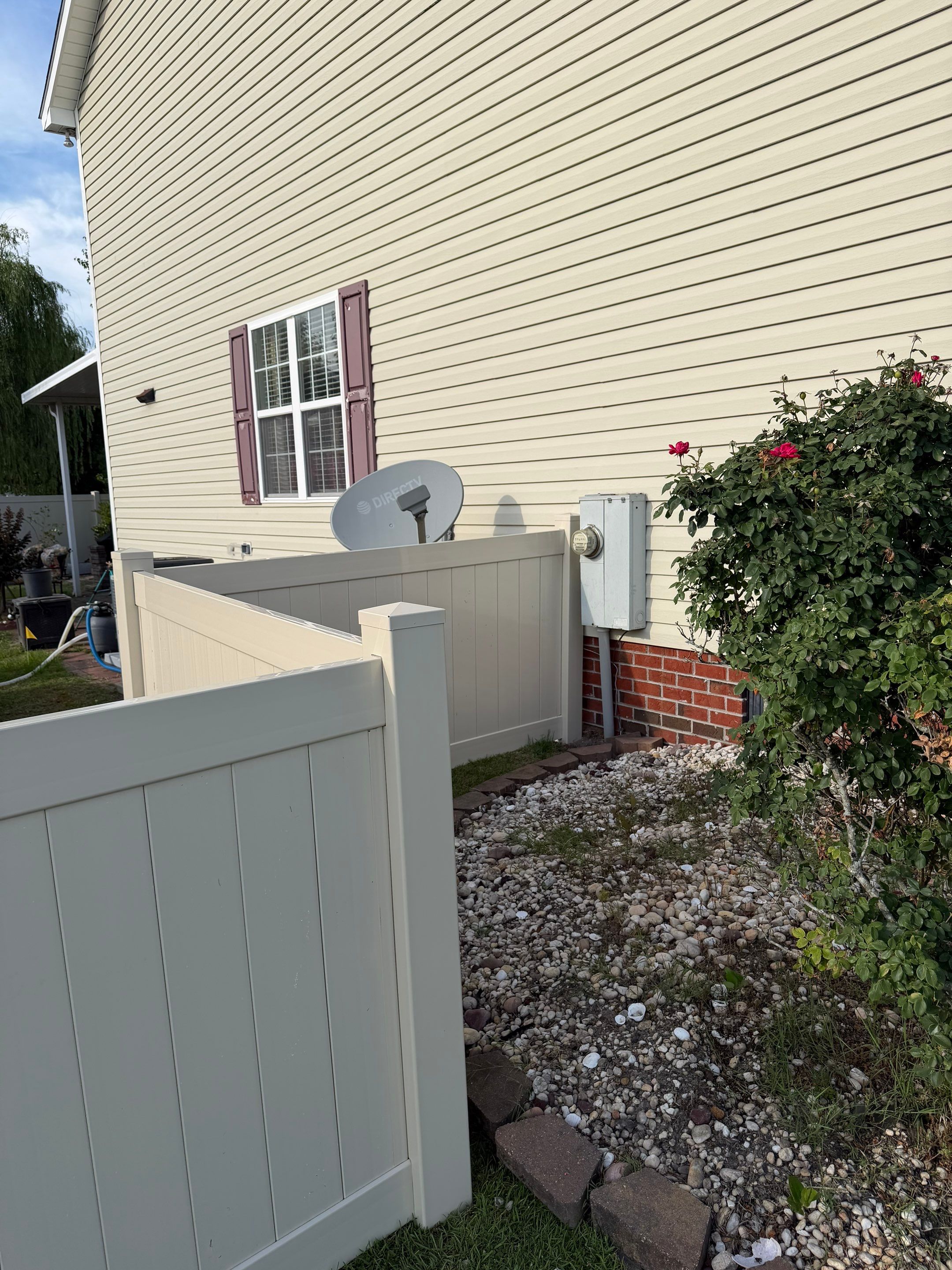 Residential Tan Vinyl Privacy Fence Installation in Winterville by Superior Fence and Rail