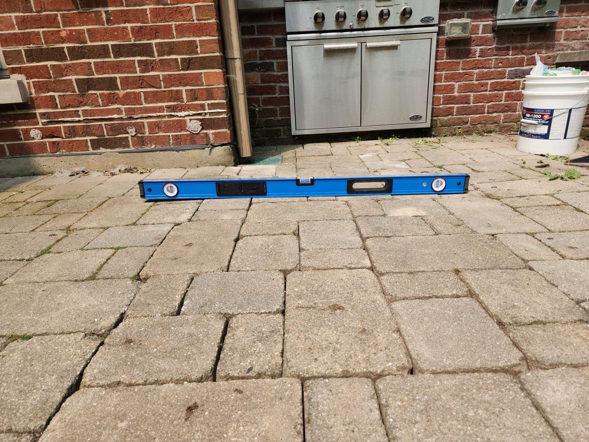 Brick paver repair, clean, seal and poly sanding by Northern Power Washing LLC.
