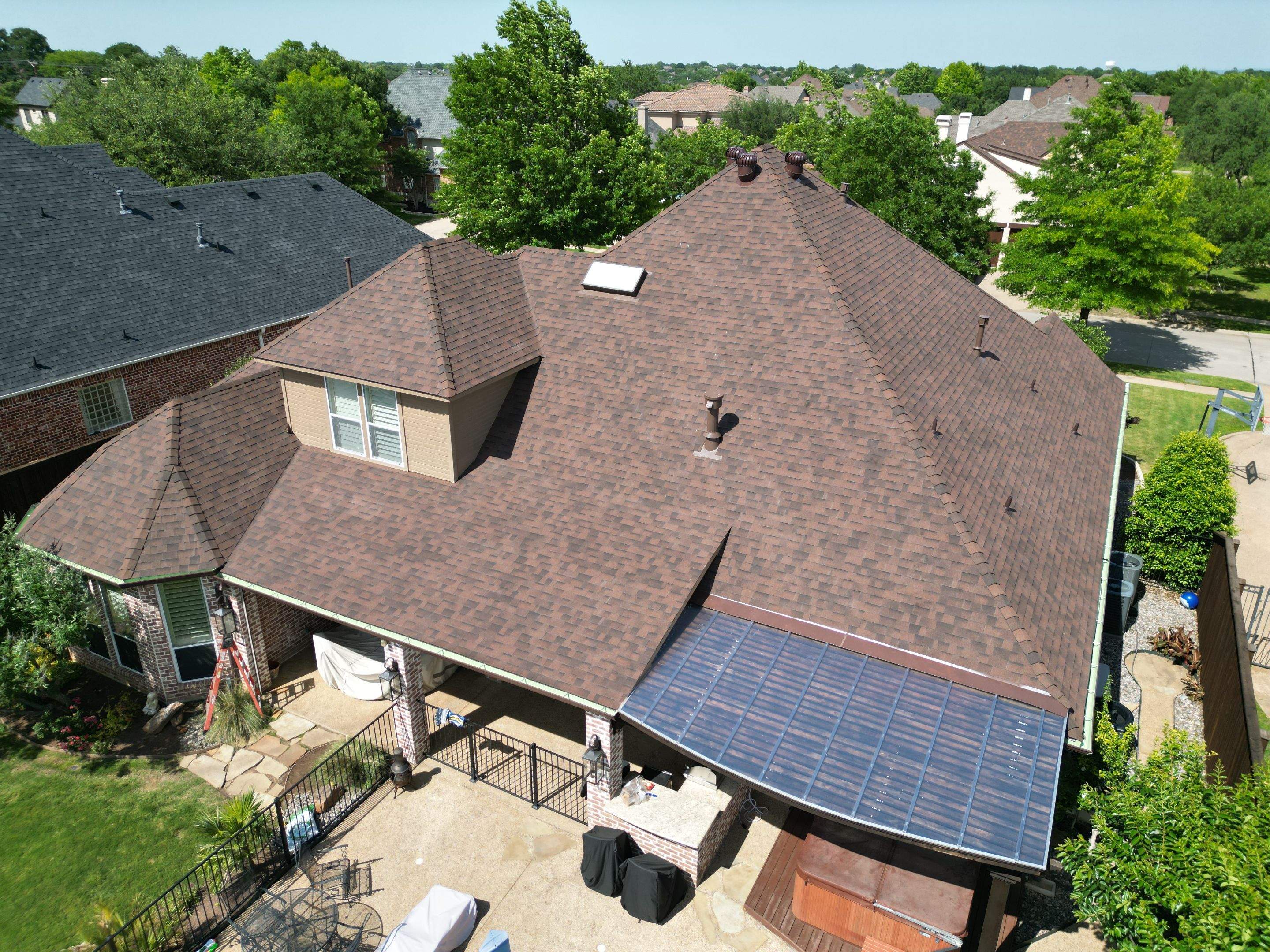 Residential Roofing Installation using Malarkey Legacy Scotchgard Shingles by Harvey Roofing & Construction