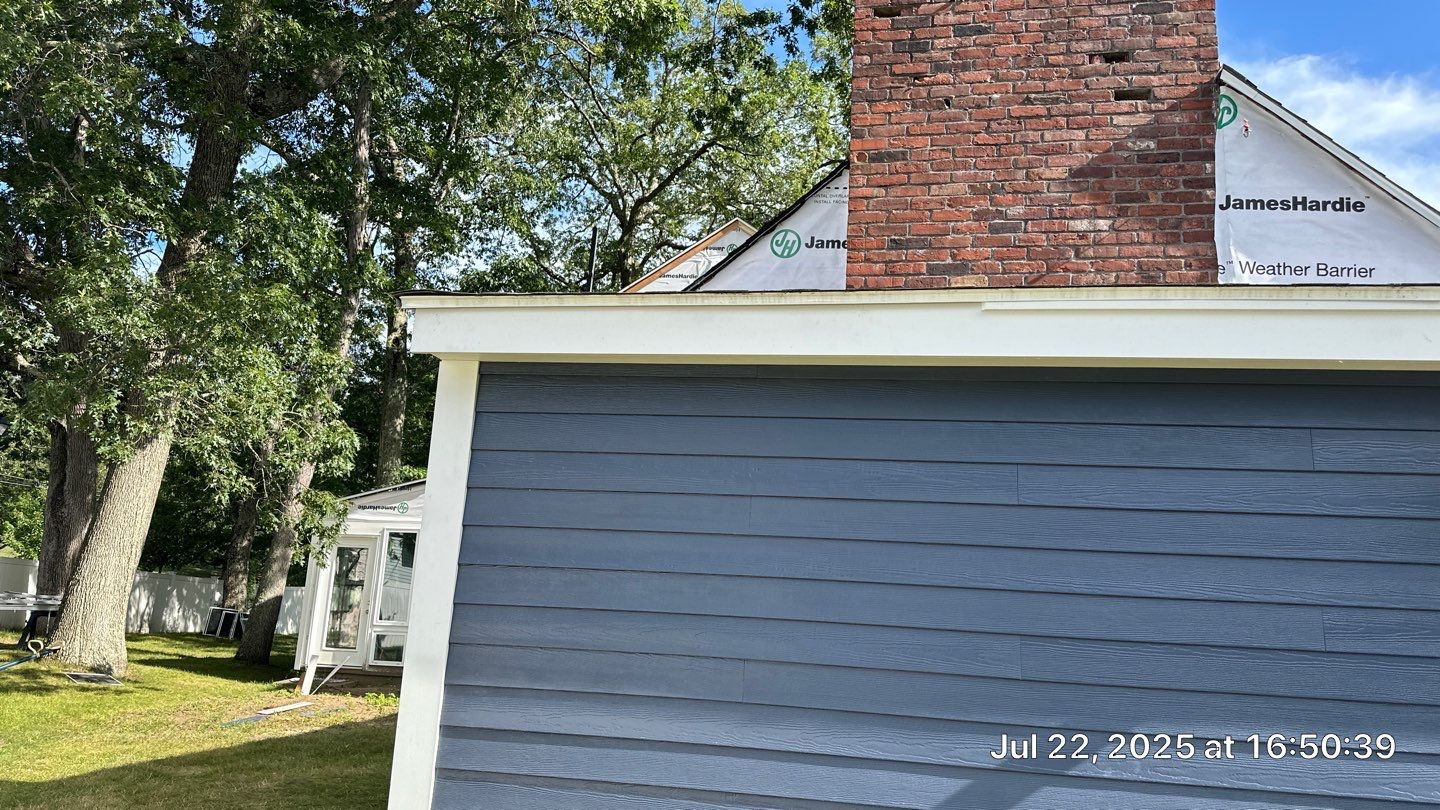 James Hardie Lap Siding Installation in Chelmsford, MA by Mighty Dog Roofing of Greater Middlesex County