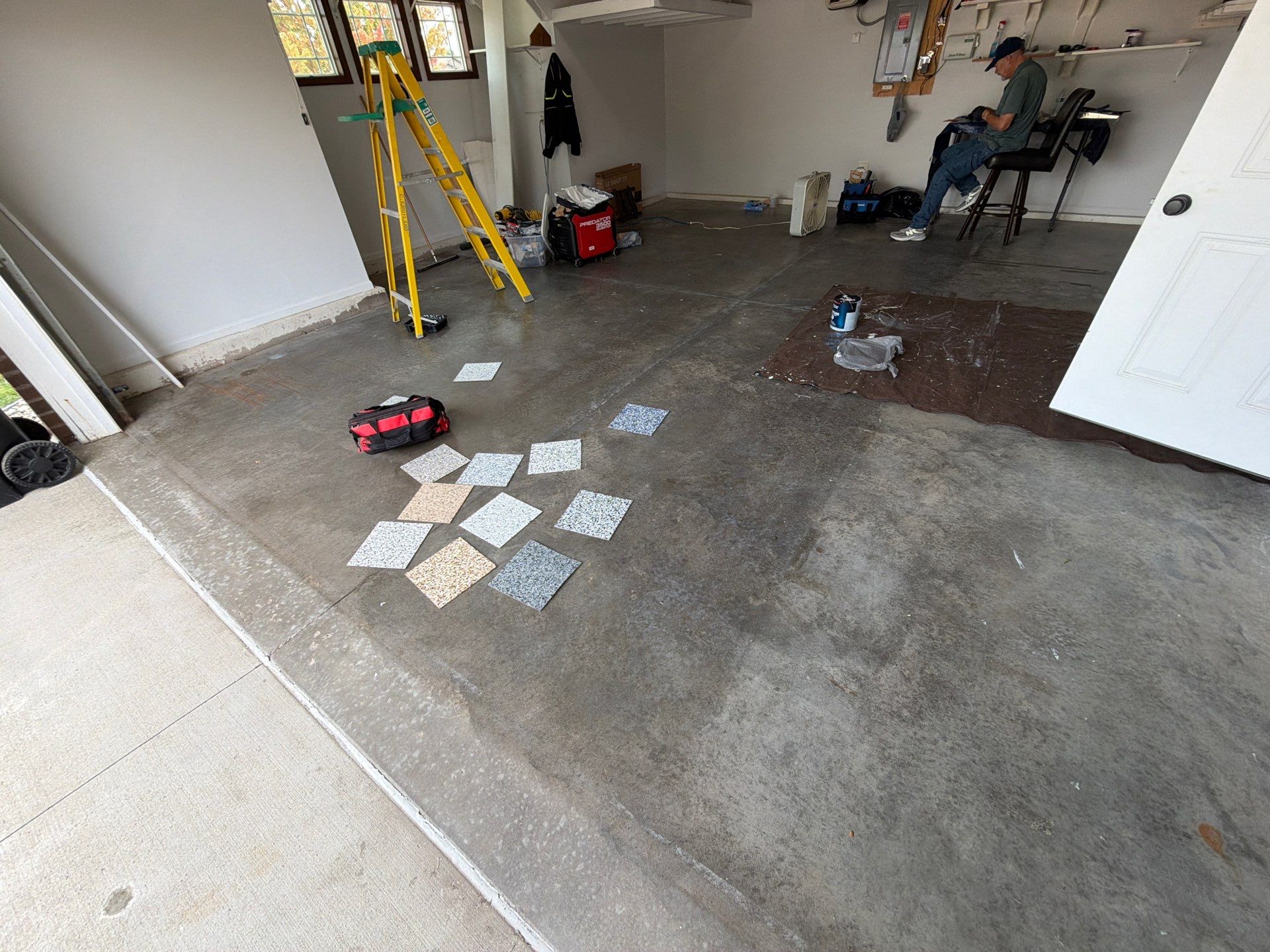 Decorative Chip Epoxy Floor Coating Installation in Sioux Falls by Select Painting, Coatings & Garage Cabinets