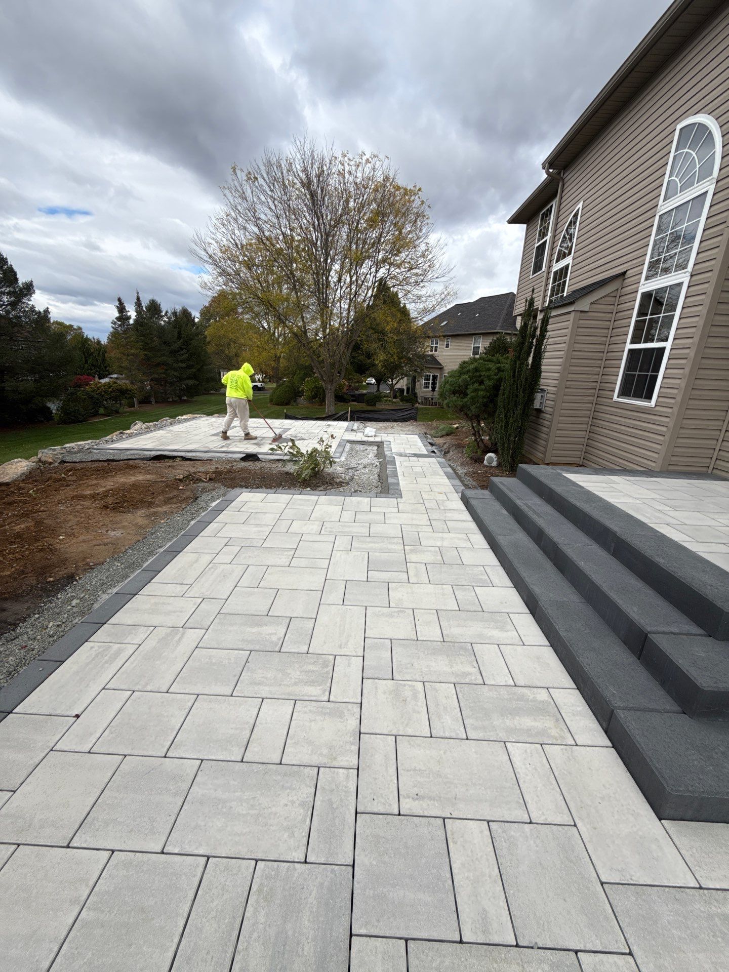 Backyard Retreat: Techo-Bloc Patio + Firepit Lounge by Saylor’s Lawn & Landscape