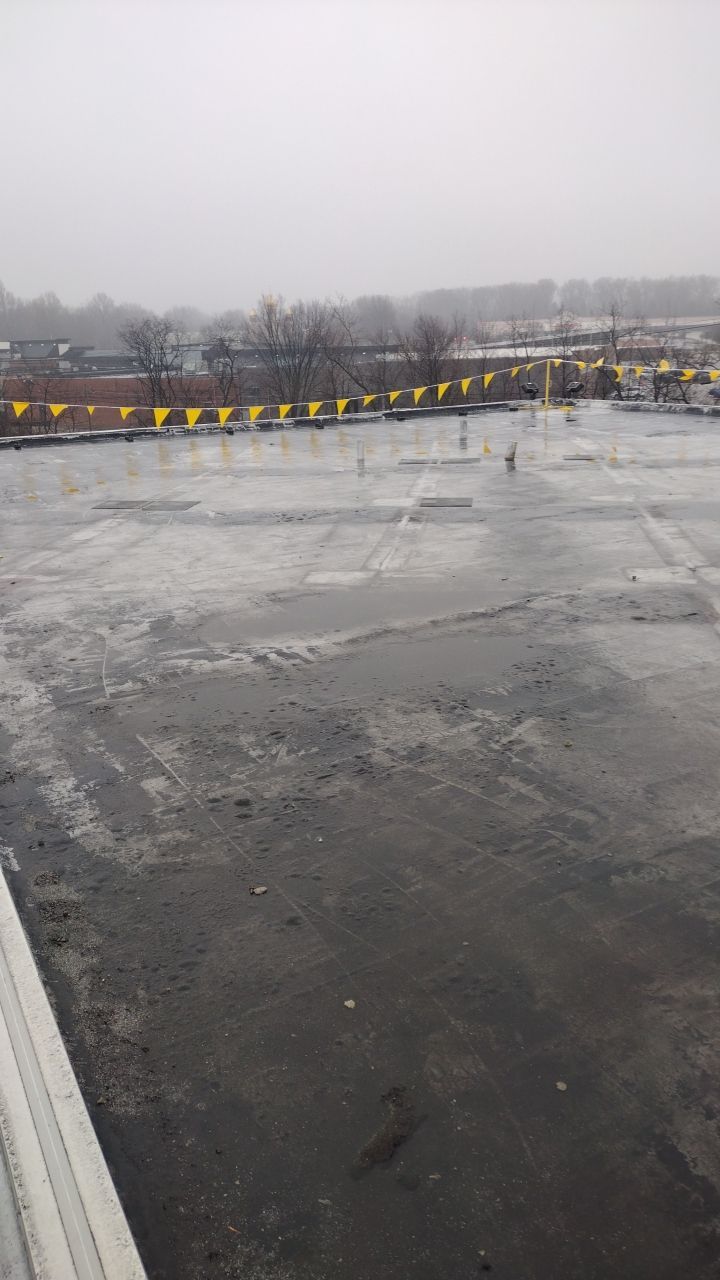 Commercial flat roof parma by Absolute Roofing and Construction