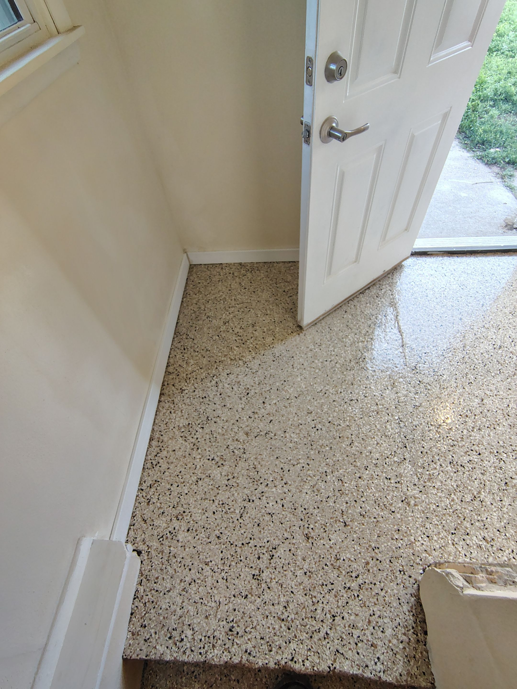 Comprehensive Basement Concrete Floor Coating and Crack Repair in Sioux Falls by Select Painting, Coatings & Garage Cabinets