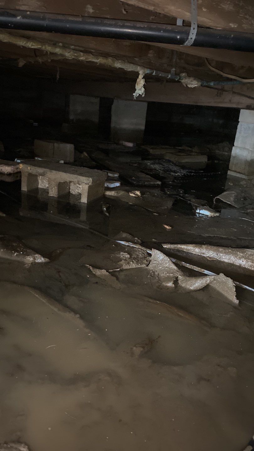Crawl space encapsulation and Waterproofing using GrateDrain Waterproofing System by Toledo Basement Repair 