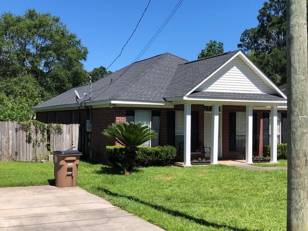 Residential Roofing Installation using Roof Replacement by American Roofing & Construction LLC