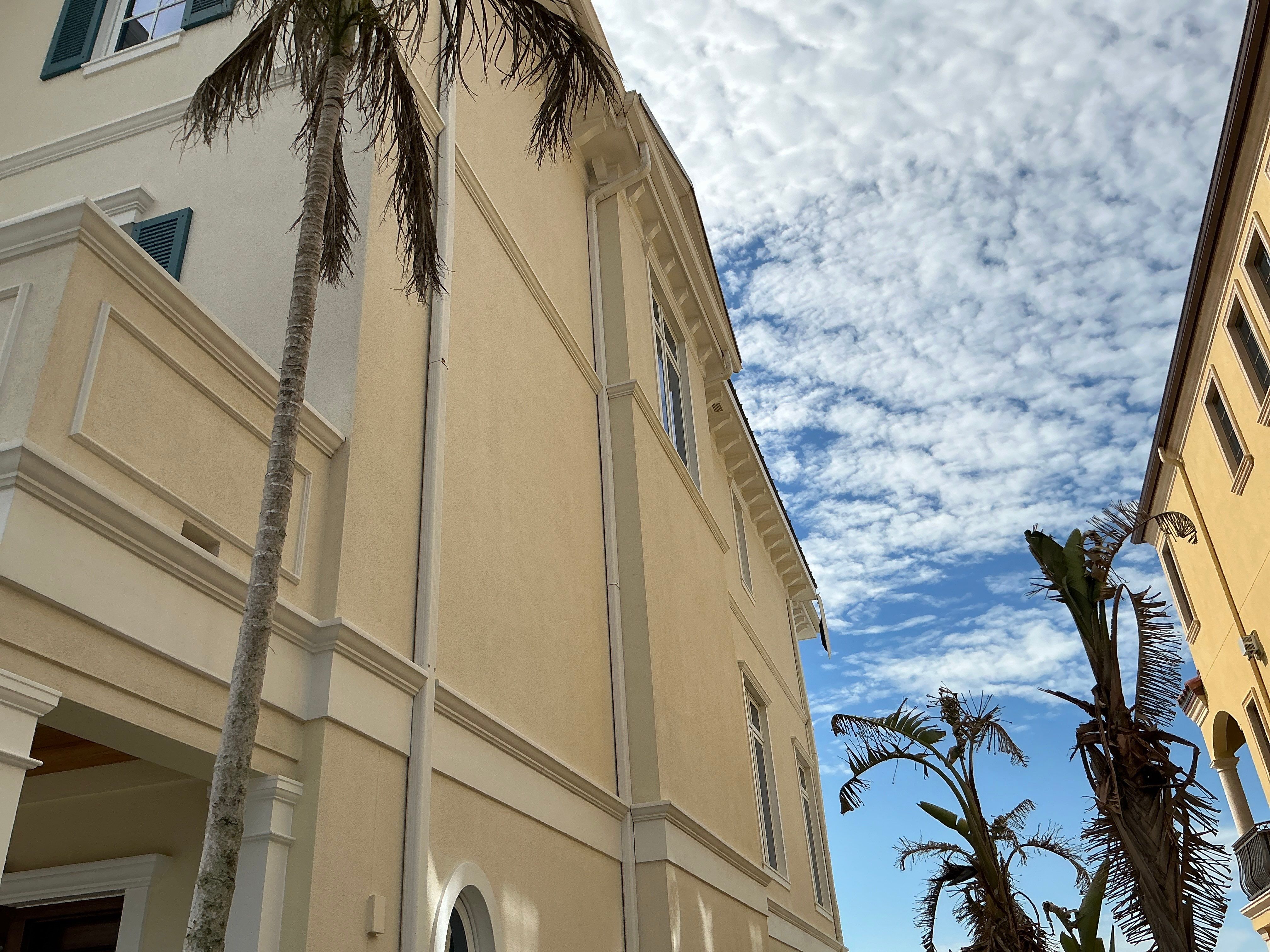 White Seamless Gutters and Downspouts in Longboat Key FL by Gutter Professors