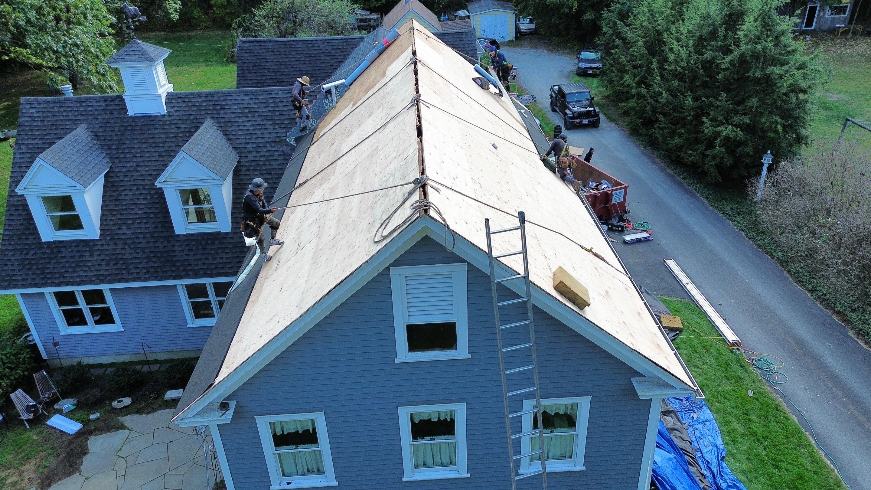 Roof Replacement & Chimney Removal – Westford, MA by Mighty Dog Roofing of Greater Middlesex County