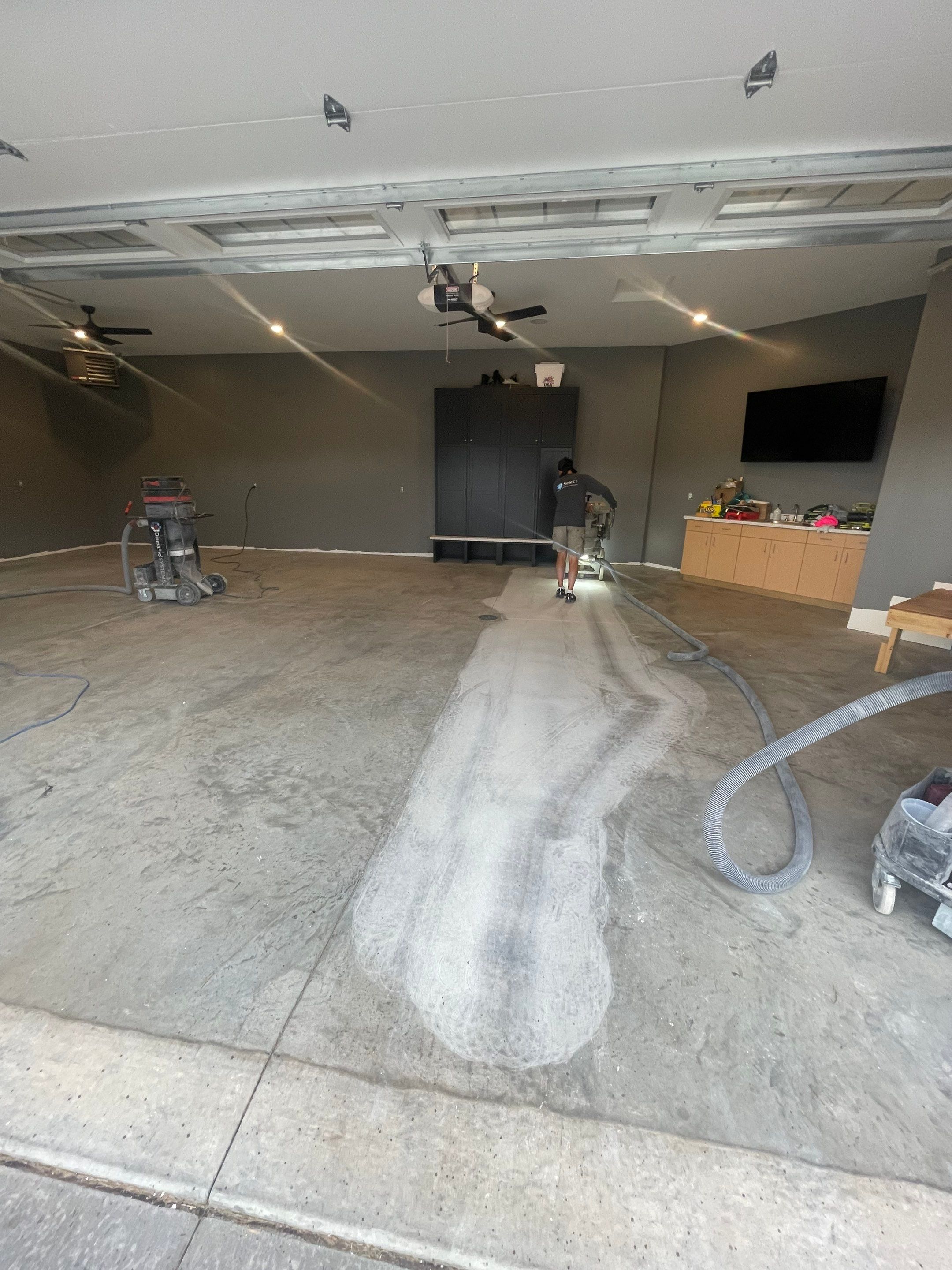 Custom Speckled Concrete Coating for Dell Rapids Garage by Select Painting, Coatings & Garage Cabinets