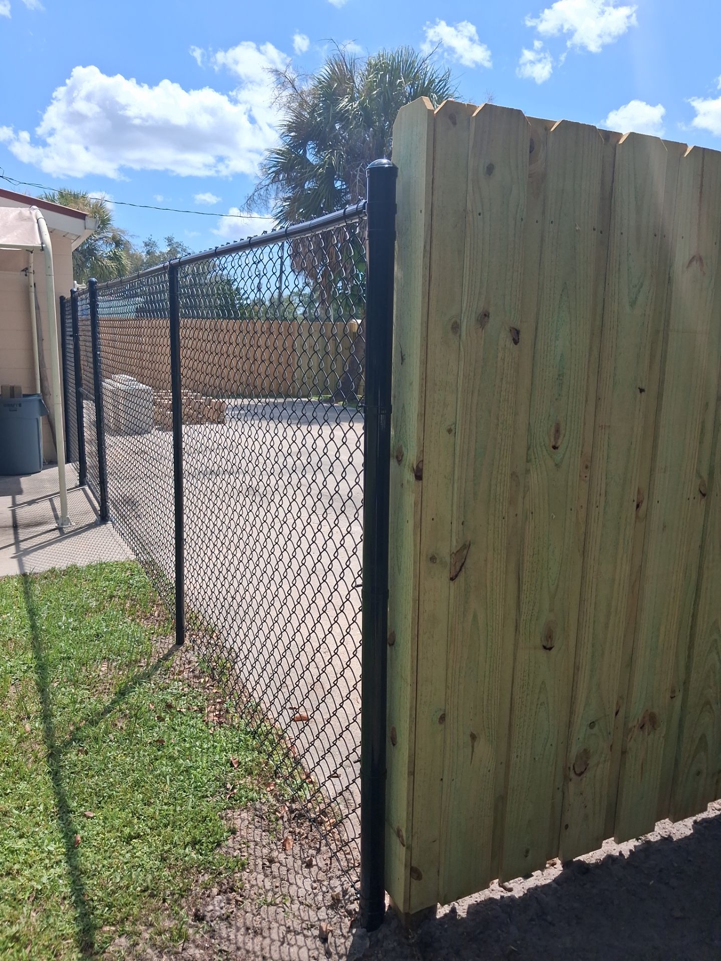 Black Vinyl Chain Link Fence Installation in Arcadia Florida by True Fence LLC