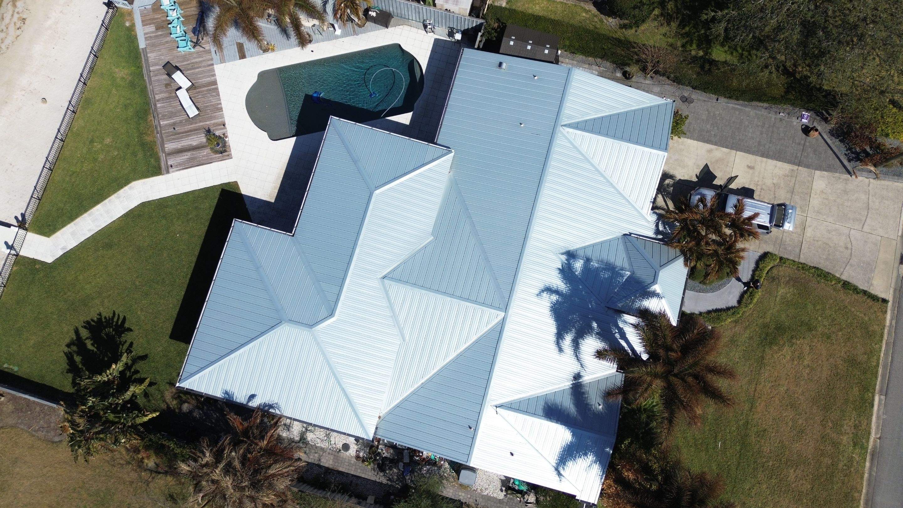 Metal reroof project in Belle Isle FL by Gold Key Roofing