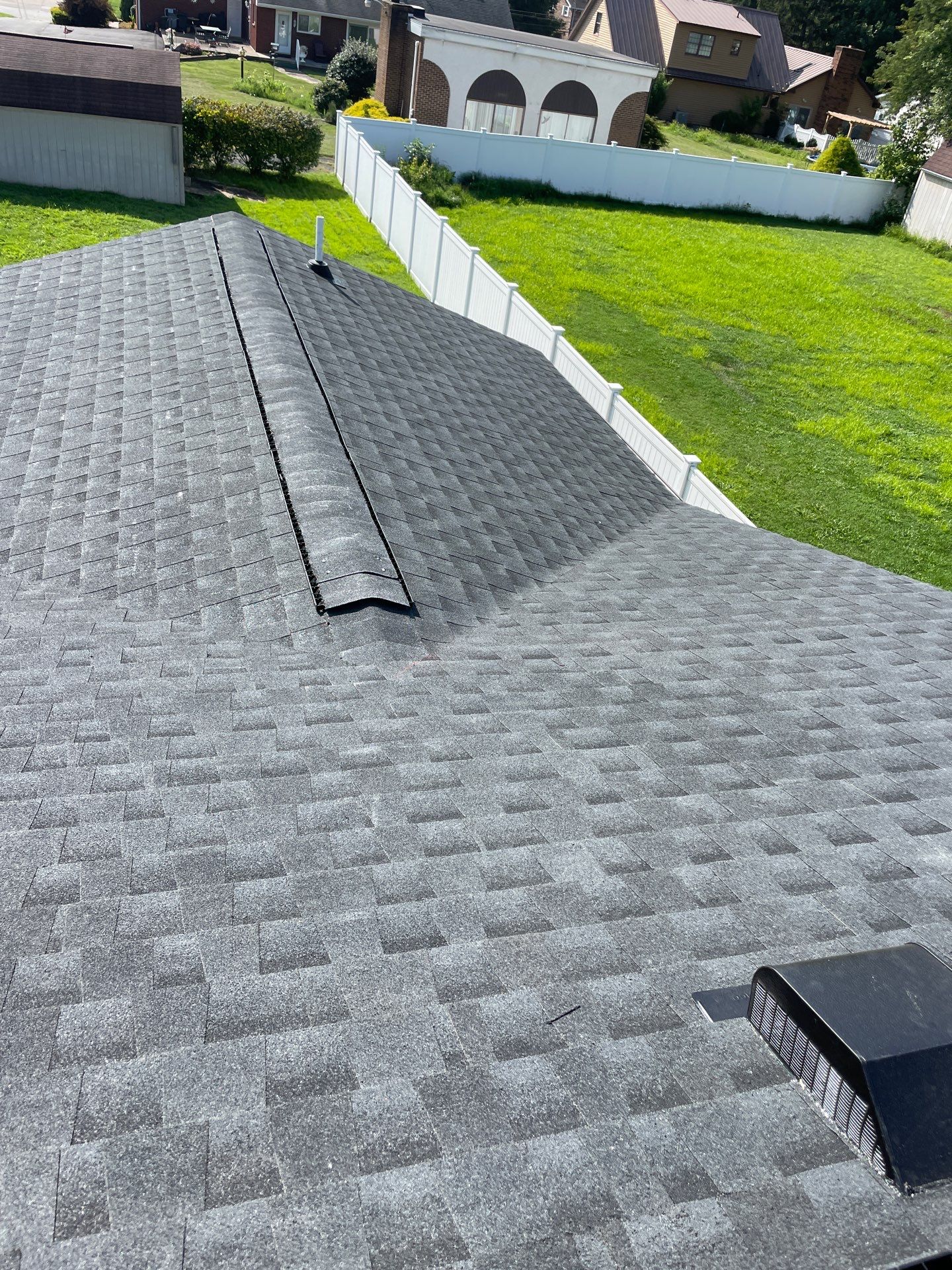 Residential Roofing Installation using GAF Timberline HDZ Charcoal by Rainstoppers Roofing