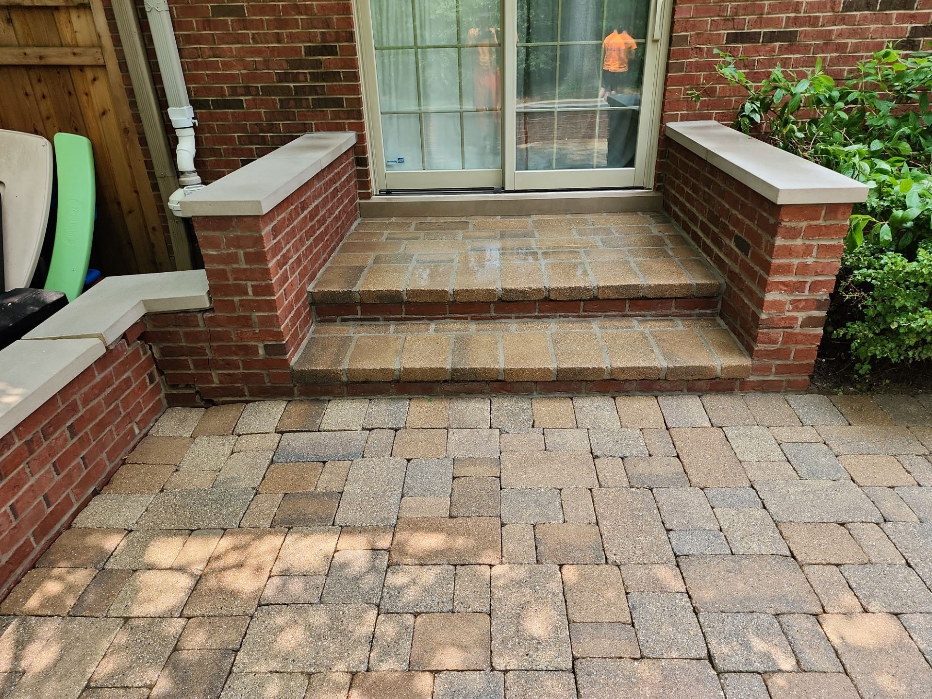 Brick paver repair, clean, seal and poly sanding by Northern Power Washing LLC.