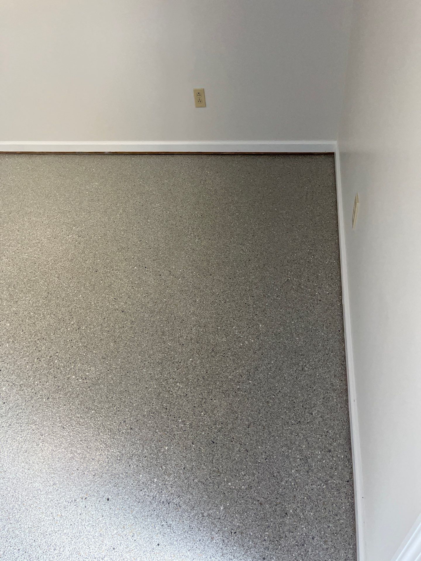 Basement Floor Coating using Quartzite by My Garage Floor Guys