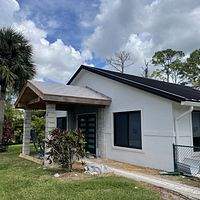 24ga 1.5" Mechanical Seam Dark Bronze by Total Roofing System The Metal Roof Experts