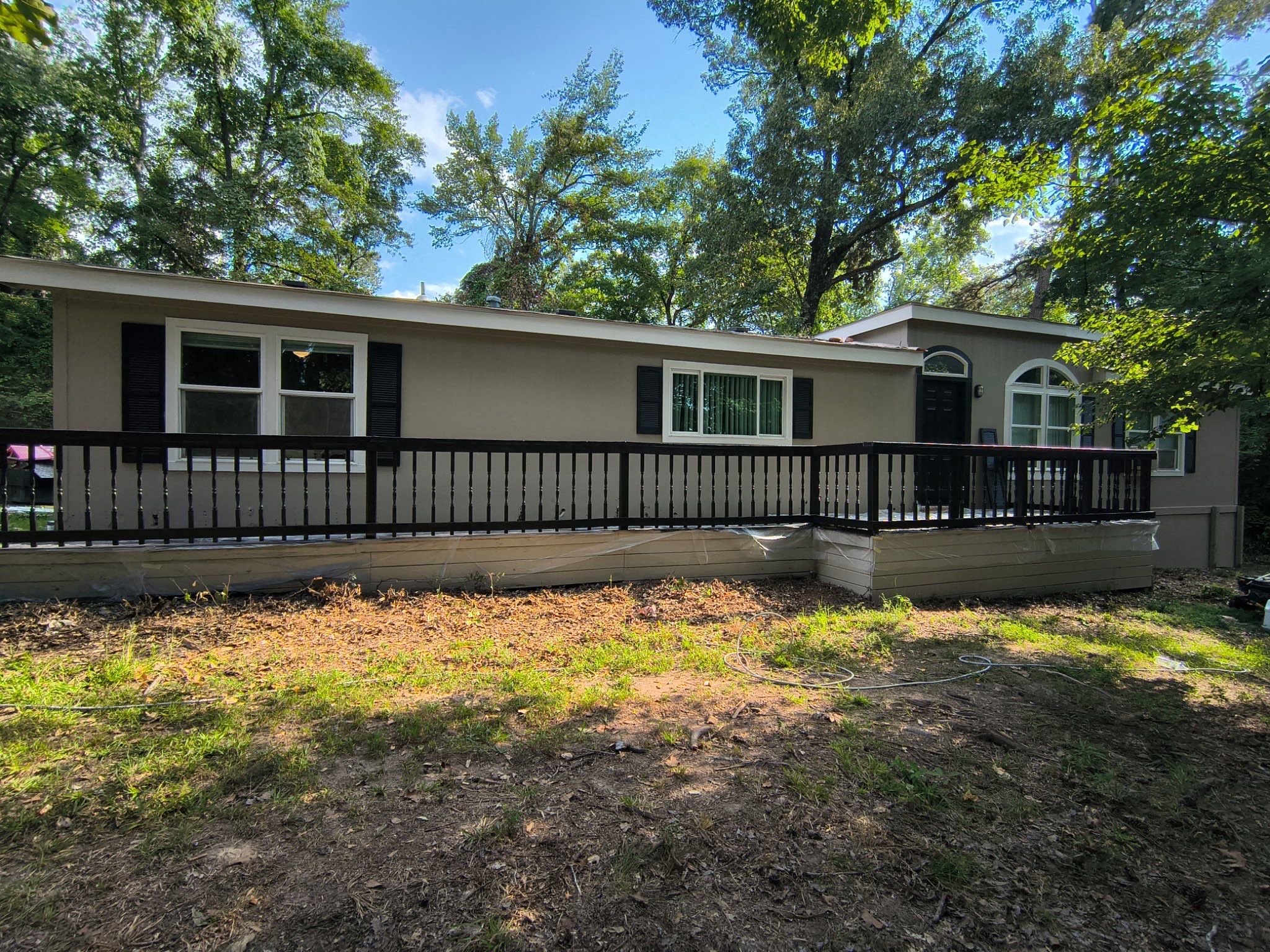 Exterior Painting in Tyler, TX | Black Back Porch, Wood & Shutters by Quality Coats Painting
