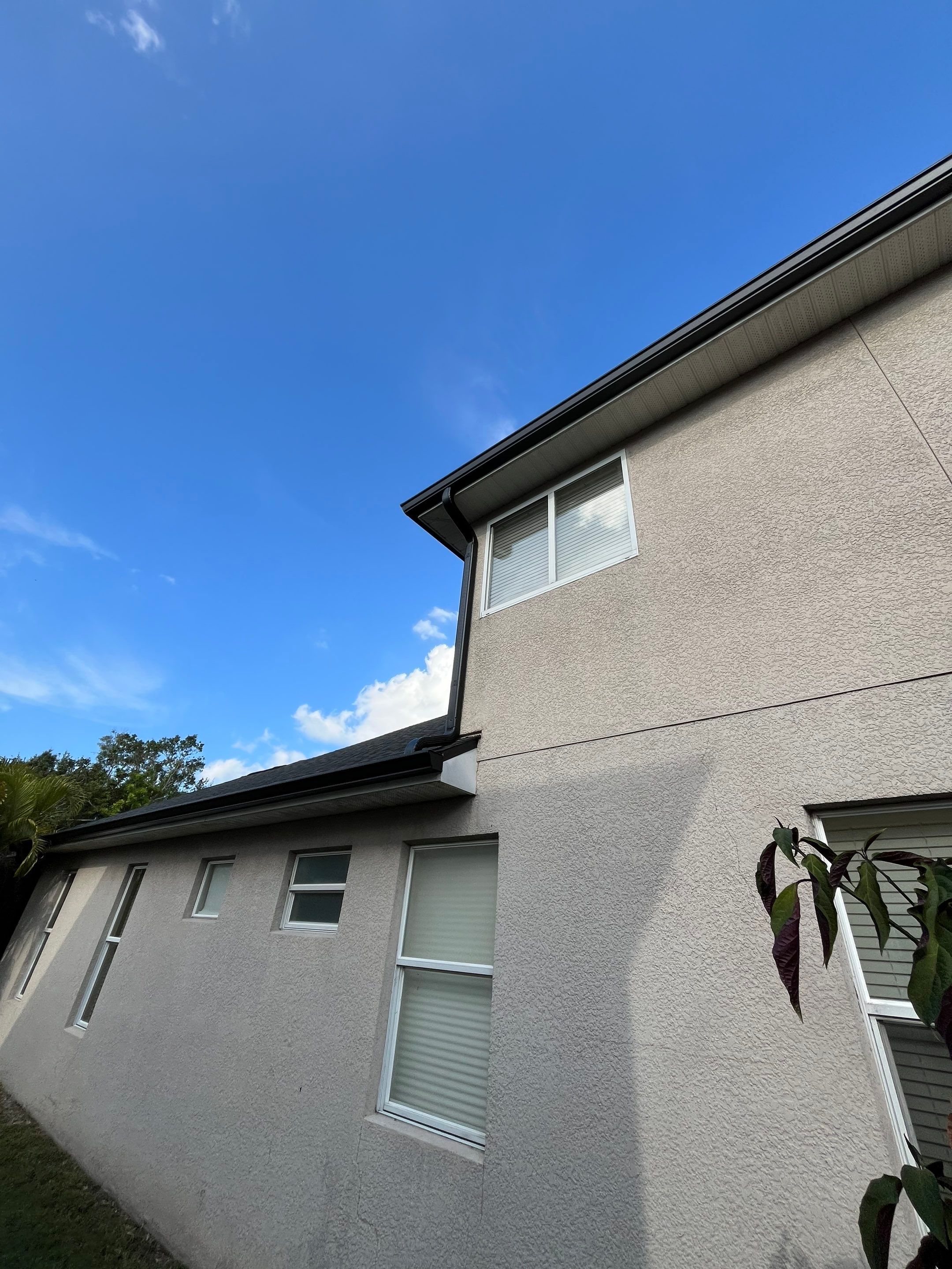 Black 6-inch Seamless Gutters for Modern Ellenton Homes FL by Gutter Professors