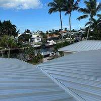 .032 Aluminum 1.5" Mechanical Seam Silver Metallic by Total Roofing System The Metal Roof Experts