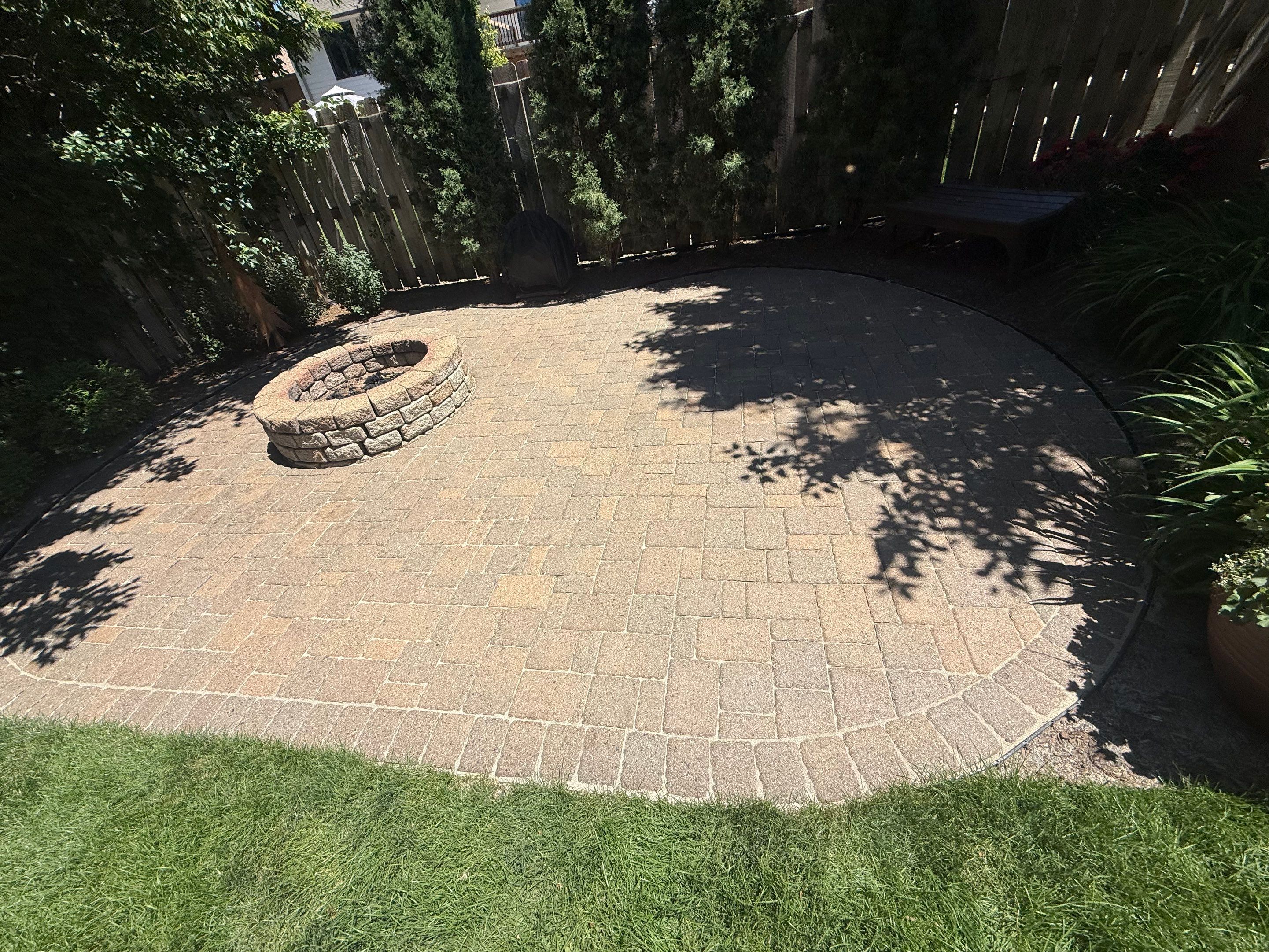 Textured Concrete Coating and Paver Patio Refresh in Sioux Falls by Select Painting, Coatings & Garage Cabinets
