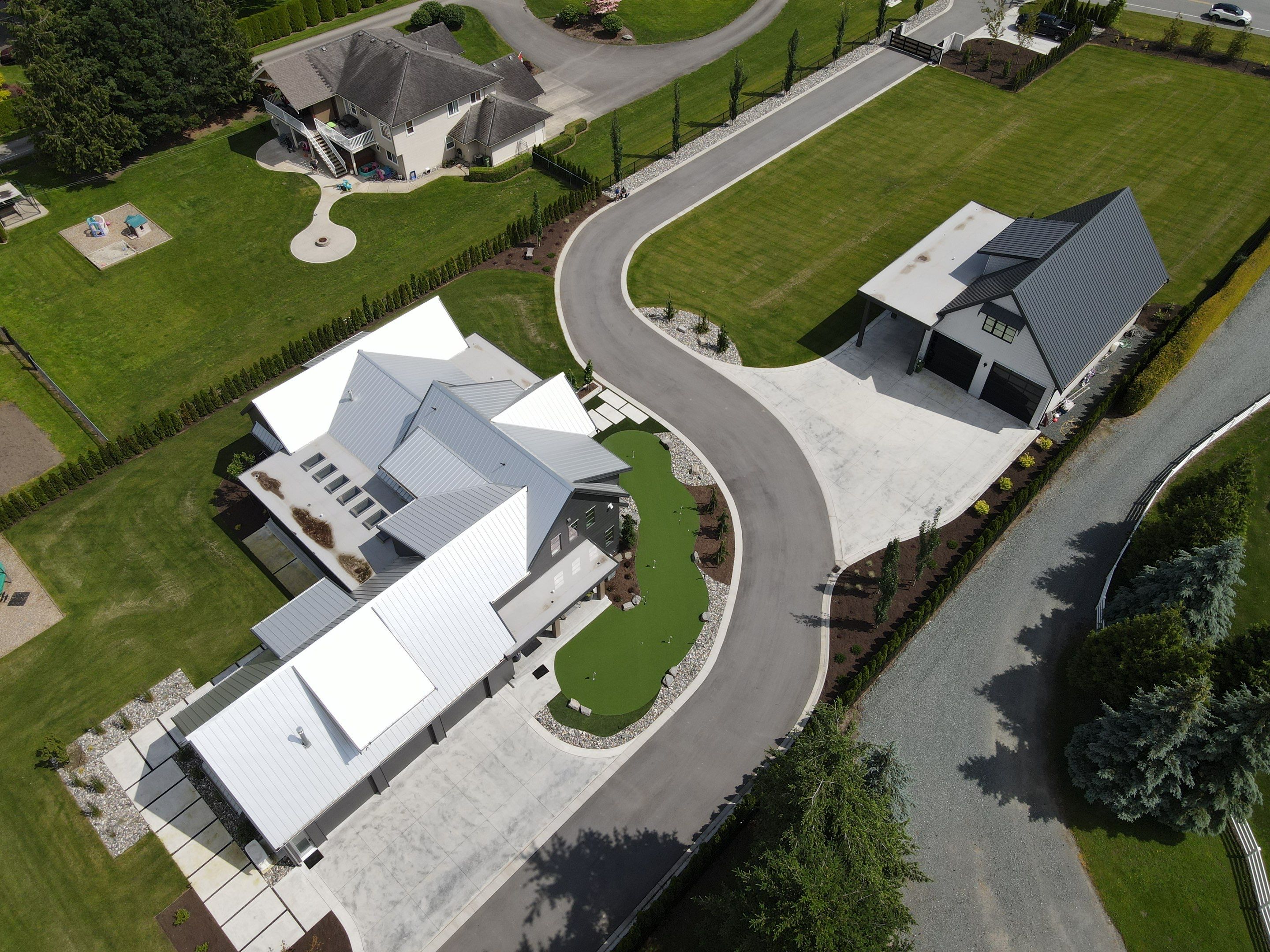 Residential Roofing Installation using 12" Prolok metal  by Top Notch Roofing Inc