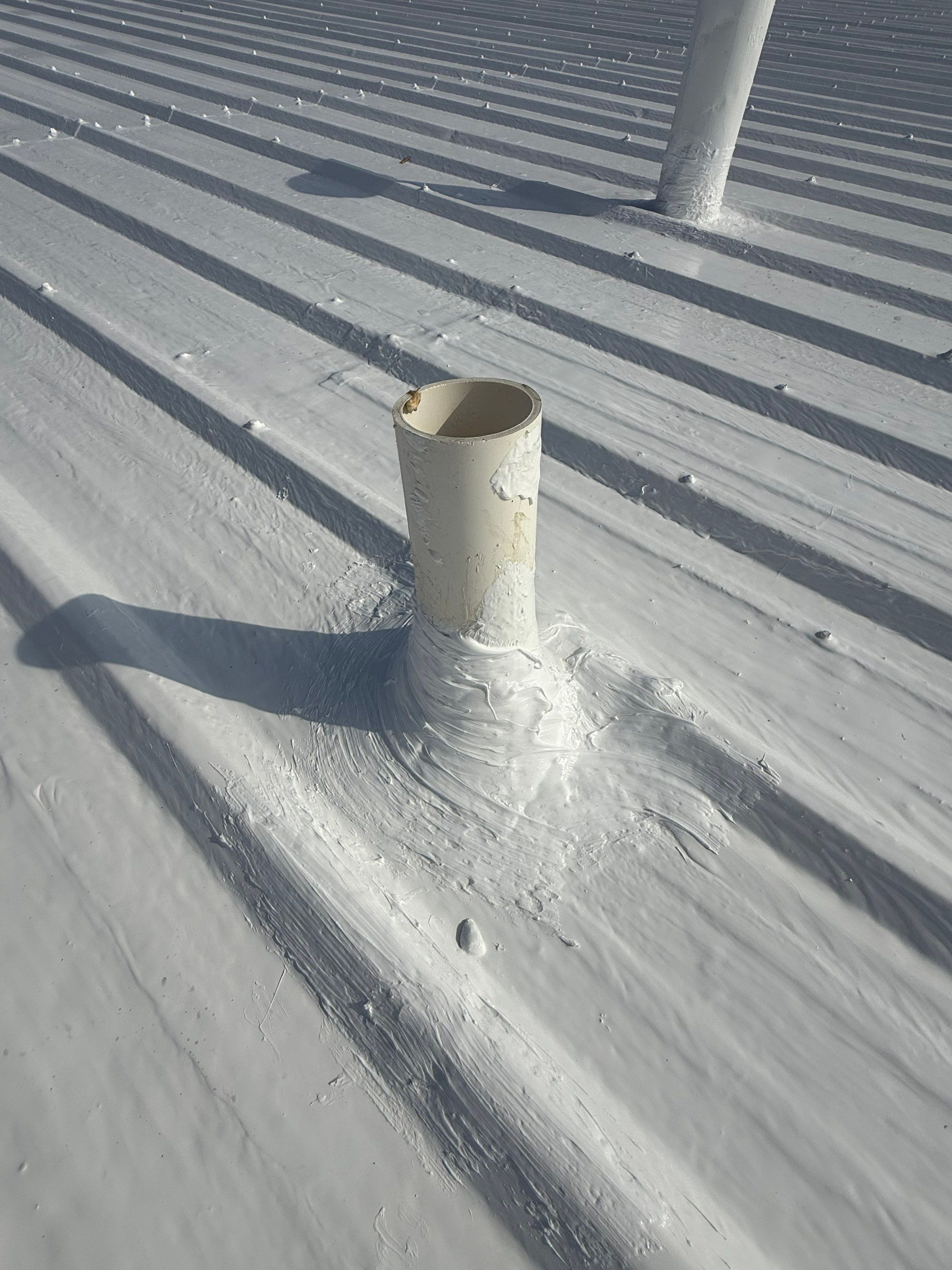 Silicone Coating Metal Rehab by First Out Roofing 