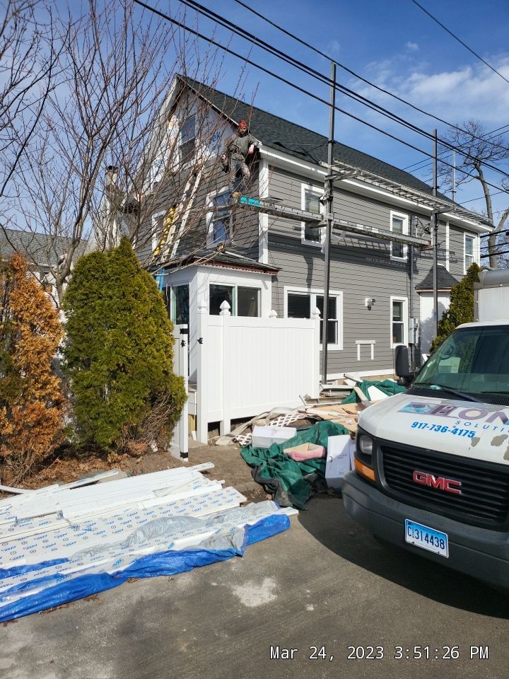 Siding Installation using Hardie Plank Aged Pewter by A Plus Exterior