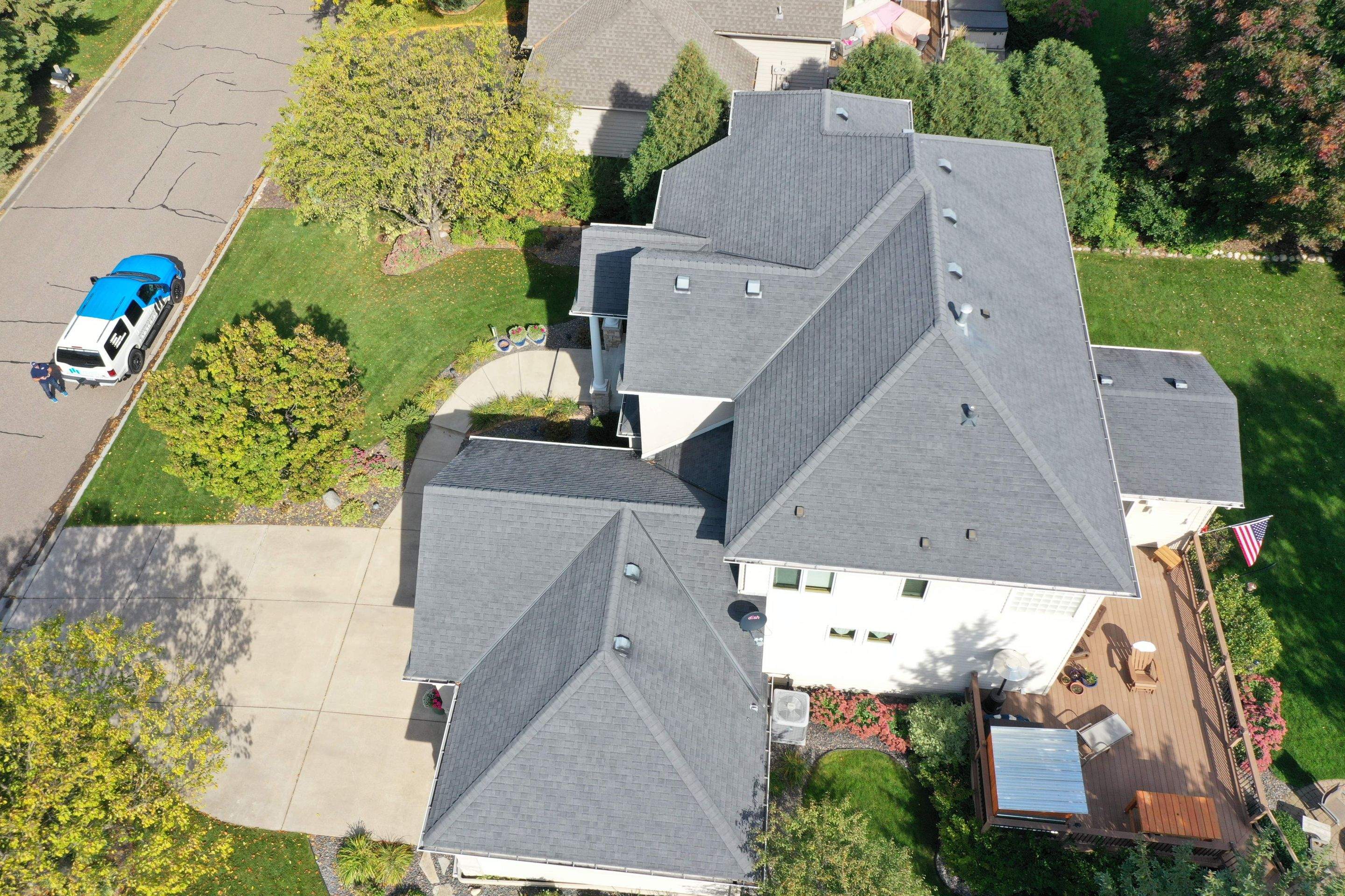 Residential Roofing Installation using Certainteed Landmark Moire Black by MODERN EXTERIOR SYSTEMS