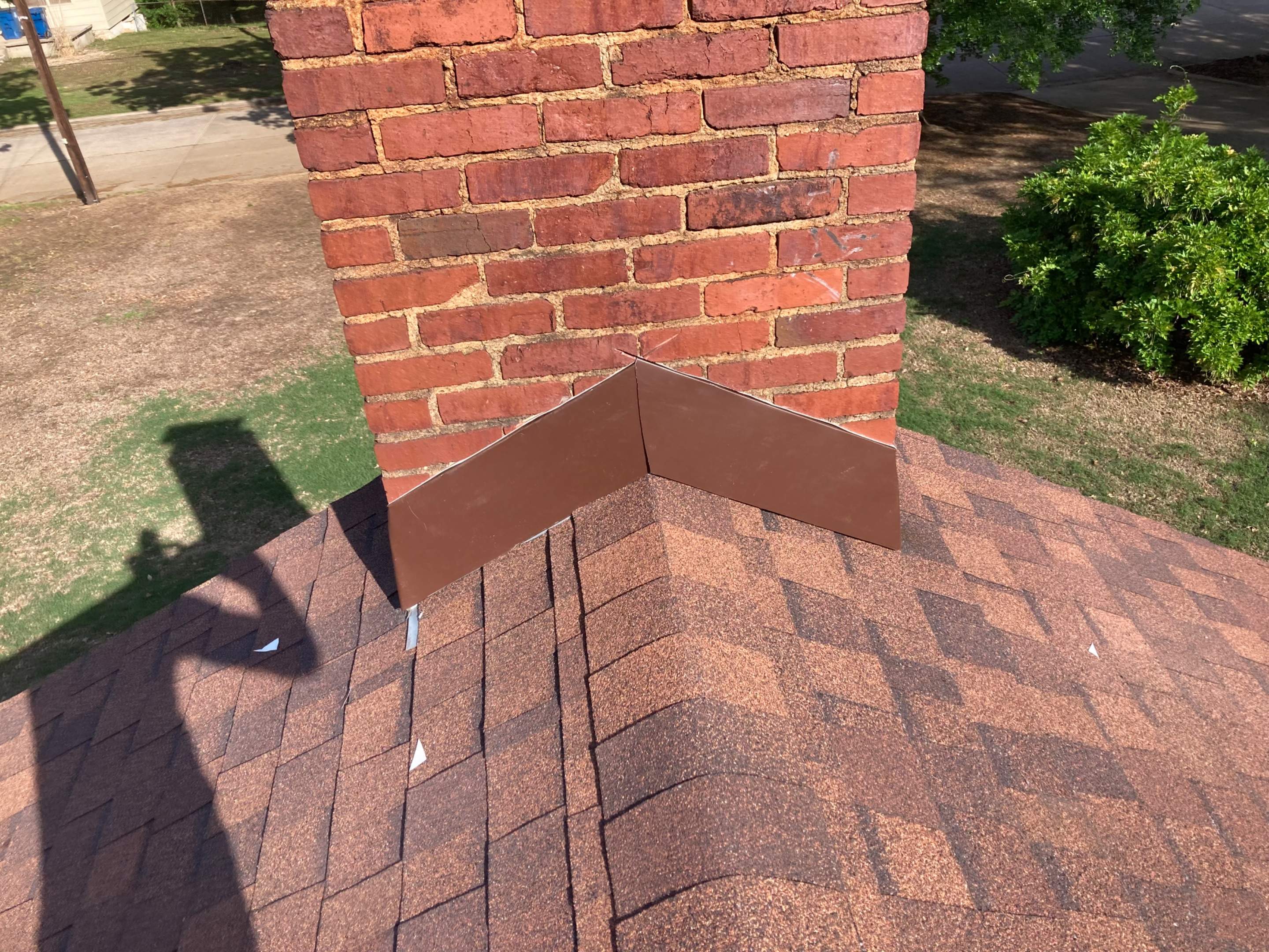 Chimney flashing using Chimney flashing kit by In & Out Construction & Remodeling, LLC