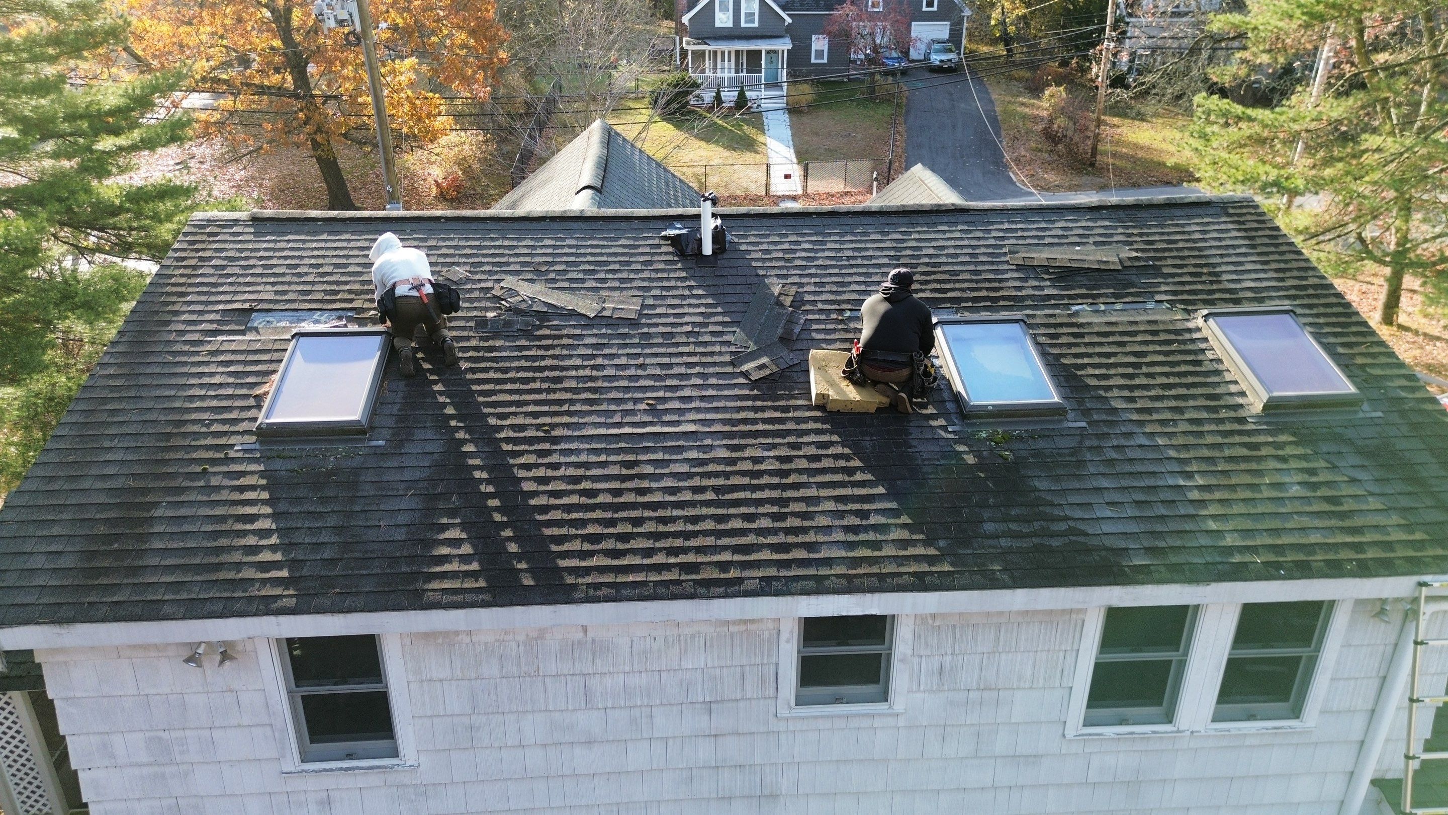 Chelmsford Triple Skylight Leak Repair with Fascia & Shingle Restoration by Mighty Dog Roofing of Greater Middlesex County
